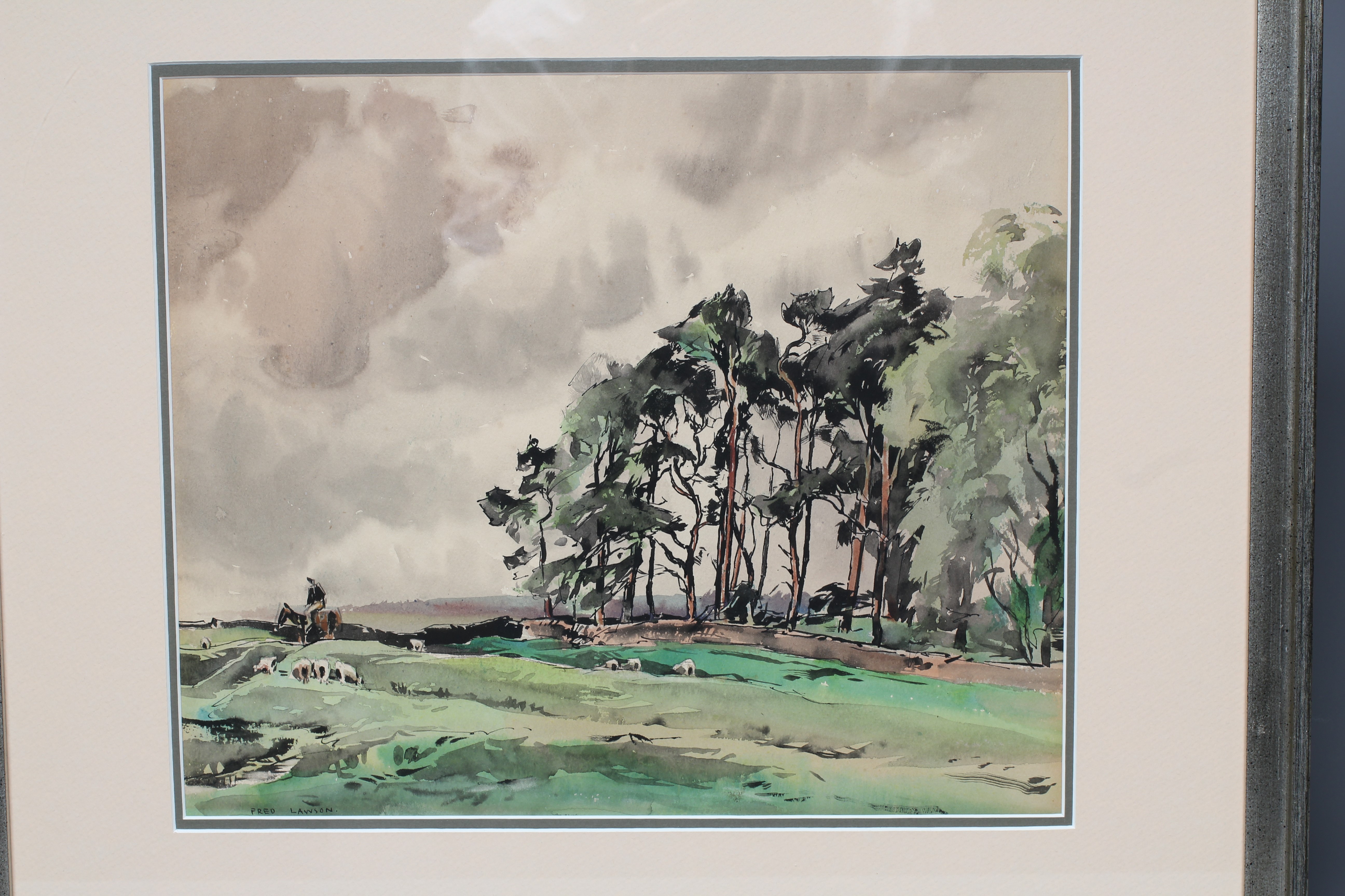 FRED LAWSON (1888-1968) Rural landscape with Man on a Horse beside a Copse, signed lower left, Image