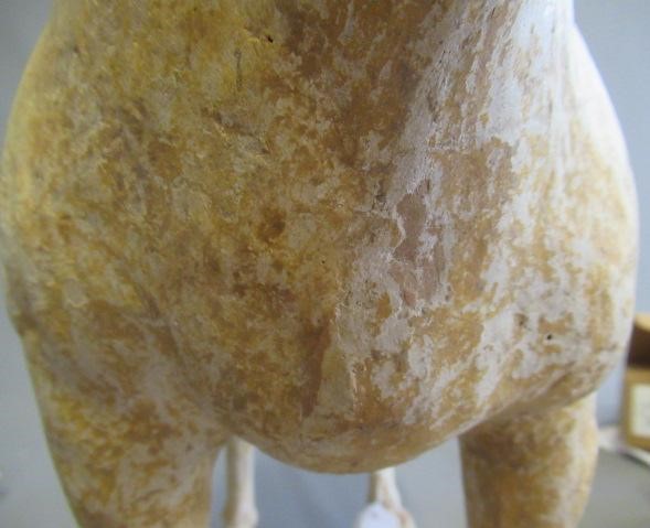A CHINESE TANG DYNASTY TERRACOTTA HORSE with deep carved mane groove and hole for tail Image