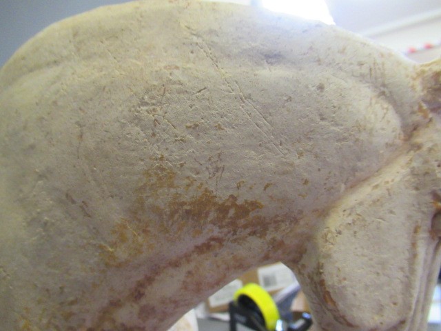 A CHINESE TANG DYNASTY TERRACOTTA HORSE with deep carved mane groove and hole for tail Image