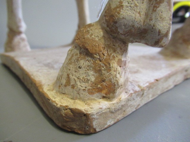 A CHINESE TANG DYNASTY TERRACOTTA HORSE with deep carved mane groove and hole for tail Image