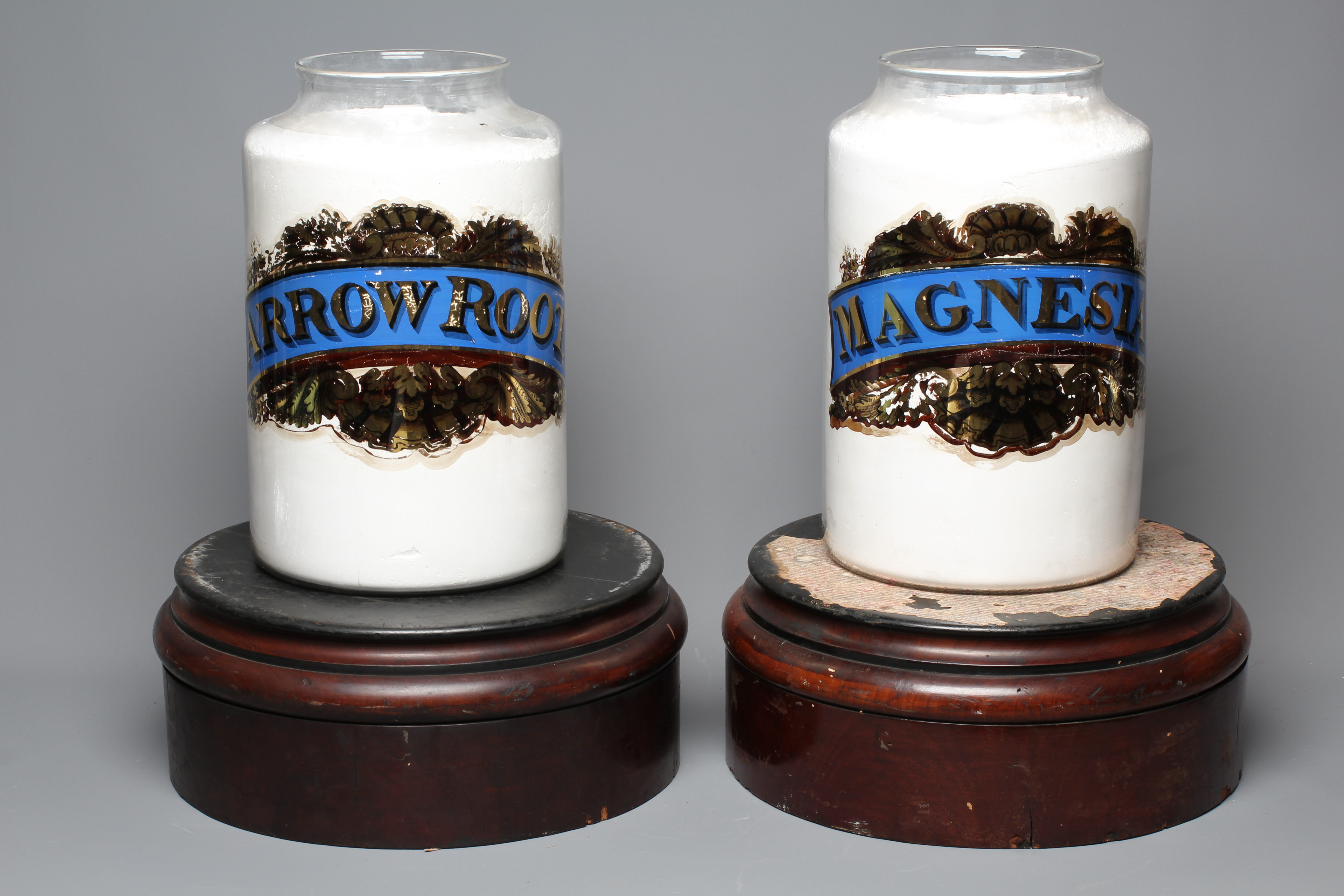 A PAIR OF APOTHECARY GLASS DISPLAY JARS Image