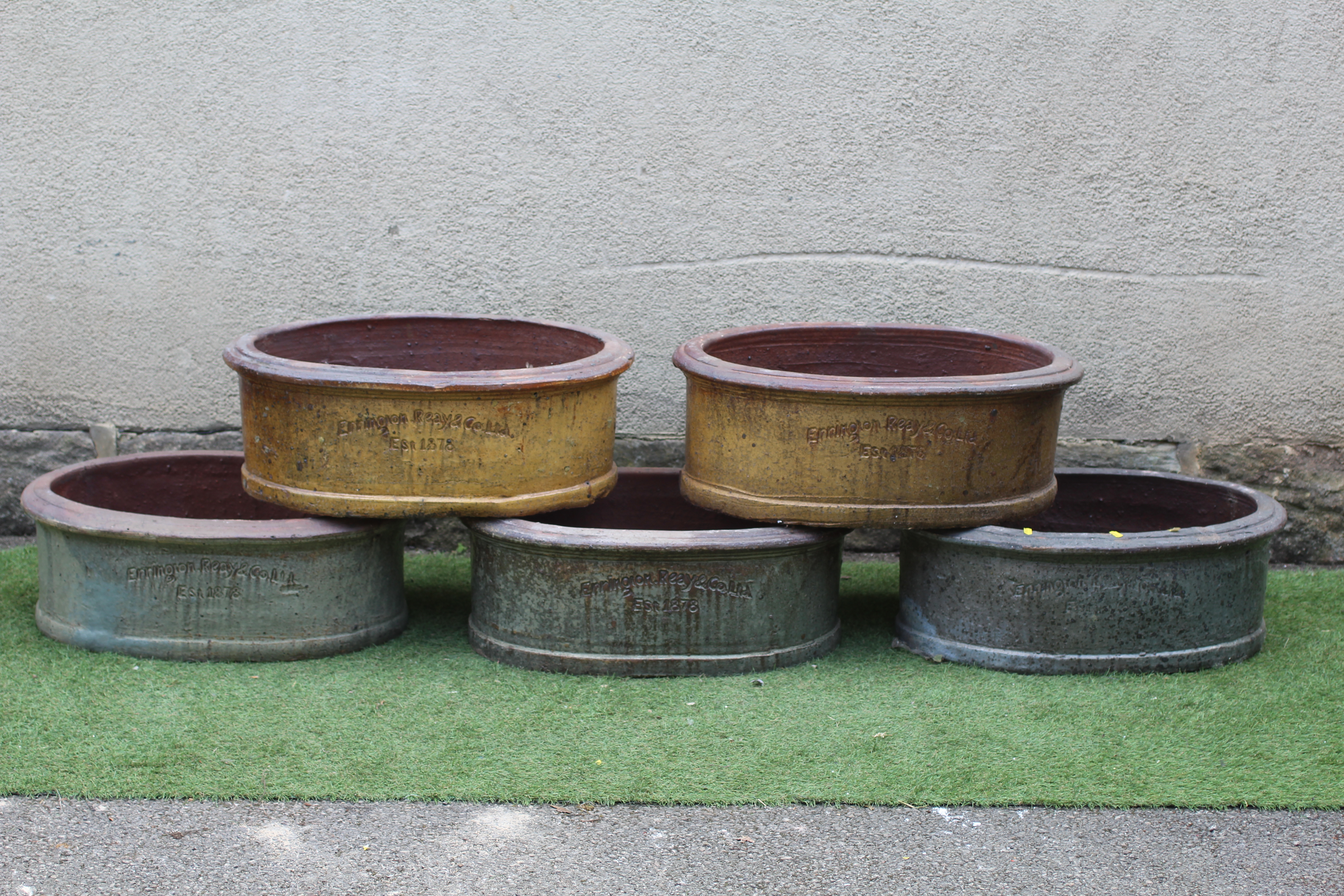 A SET OF THREE OVAL GREY GLAZED STONEWARE PLANTERS by Errington Reay & Co. Ltd., Bardon Mill, 25 Image
