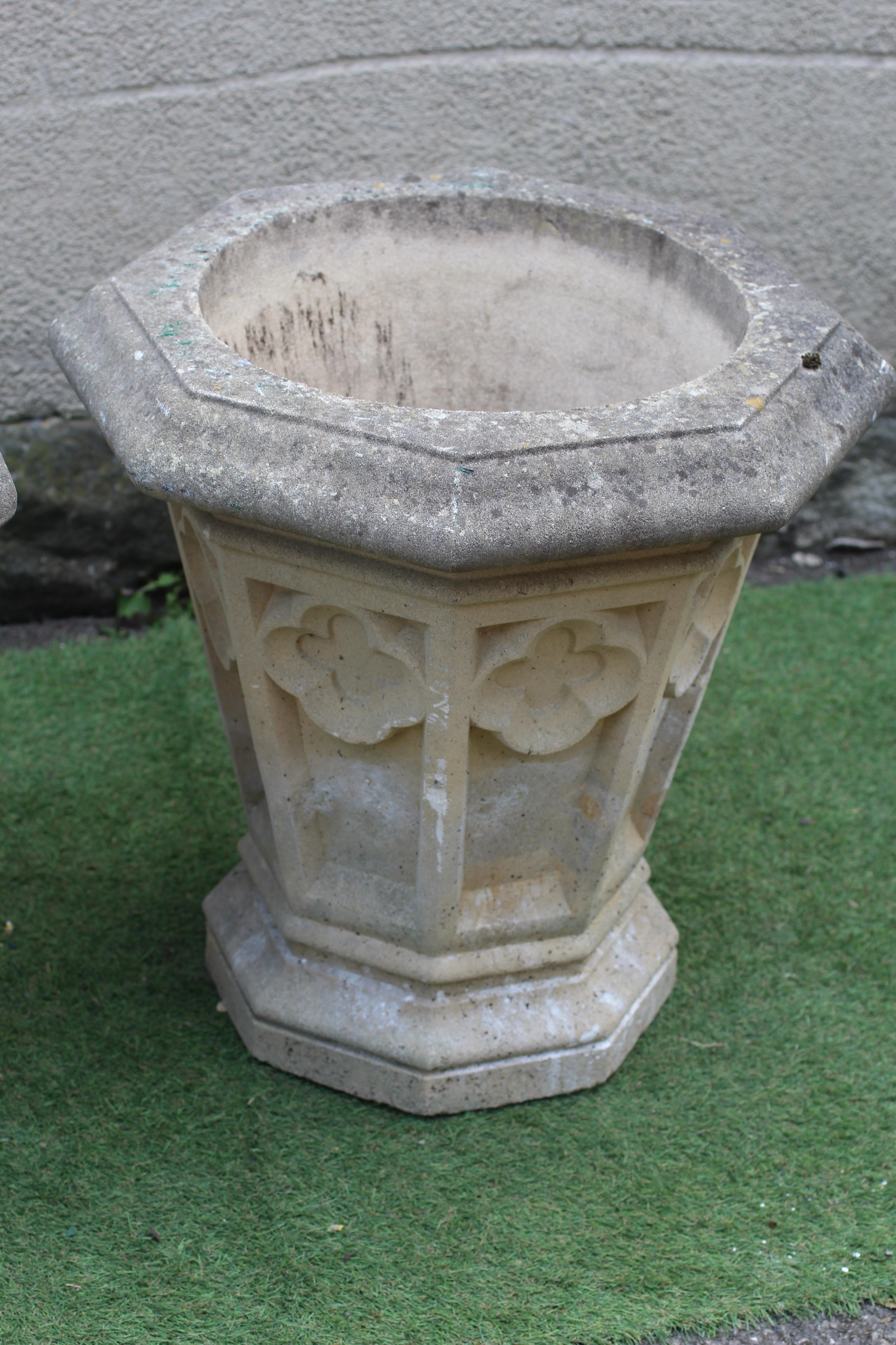 A PAIR OF CAST STONE GOTHIC PLANTERS to match previous lot Image