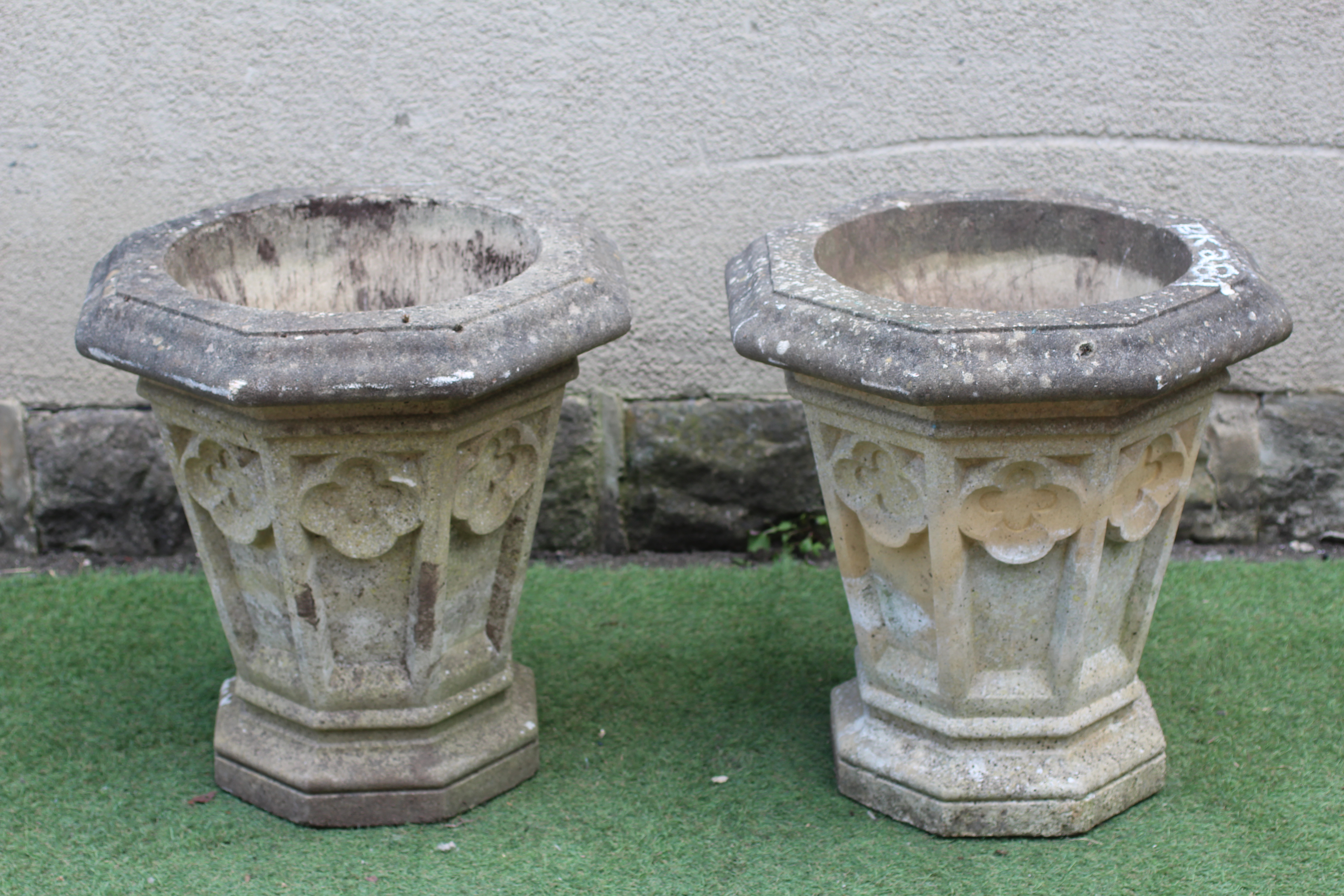 A PAIR OF CAST STONE GOTHIC PLANTERS to match previous lot Image