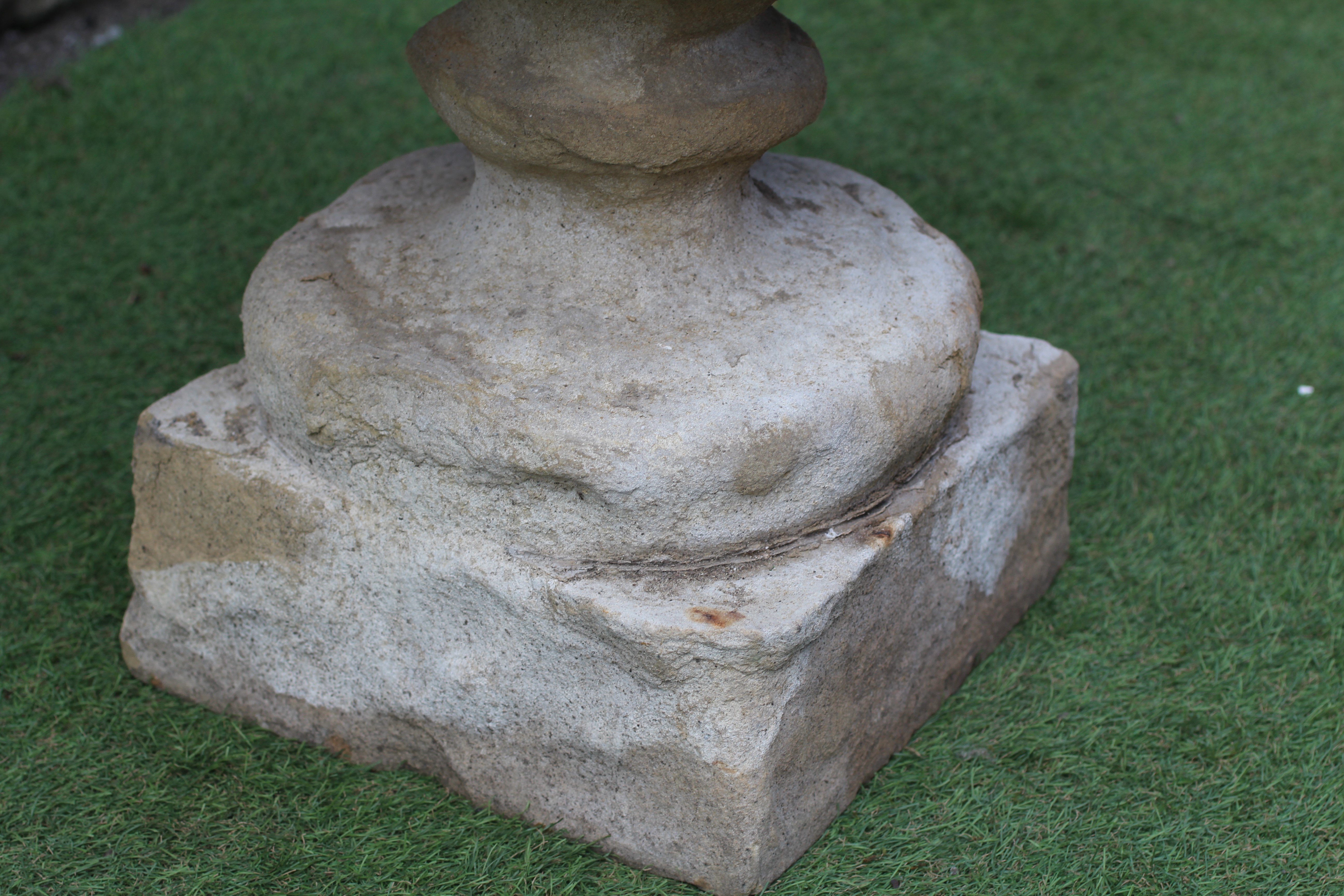 A SANDSTONE CAMPANA URN, 19th century/earlier(?), with fold over rim, the bowl with bearded male Image