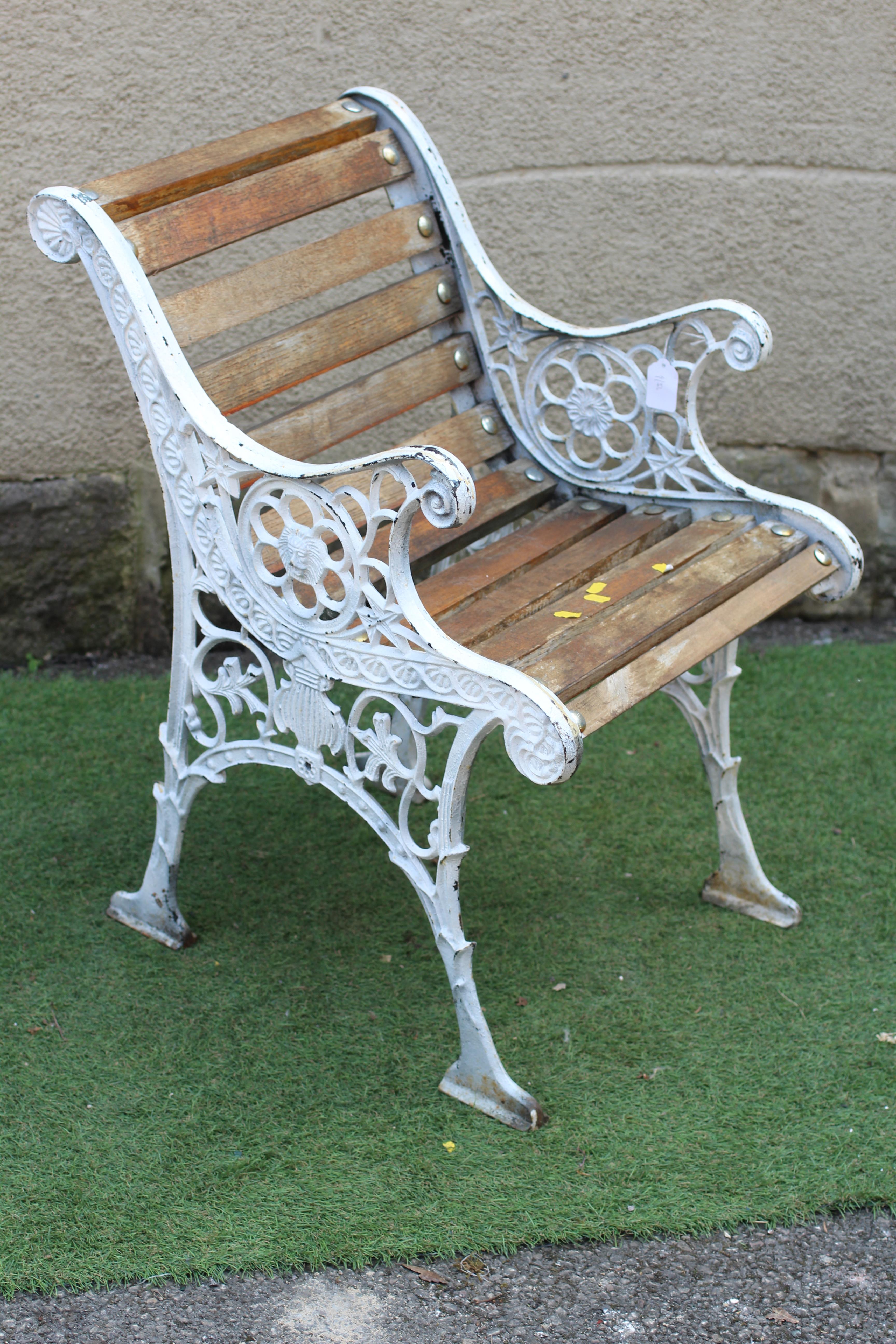 A CAST METAL ARMCHAIR Image