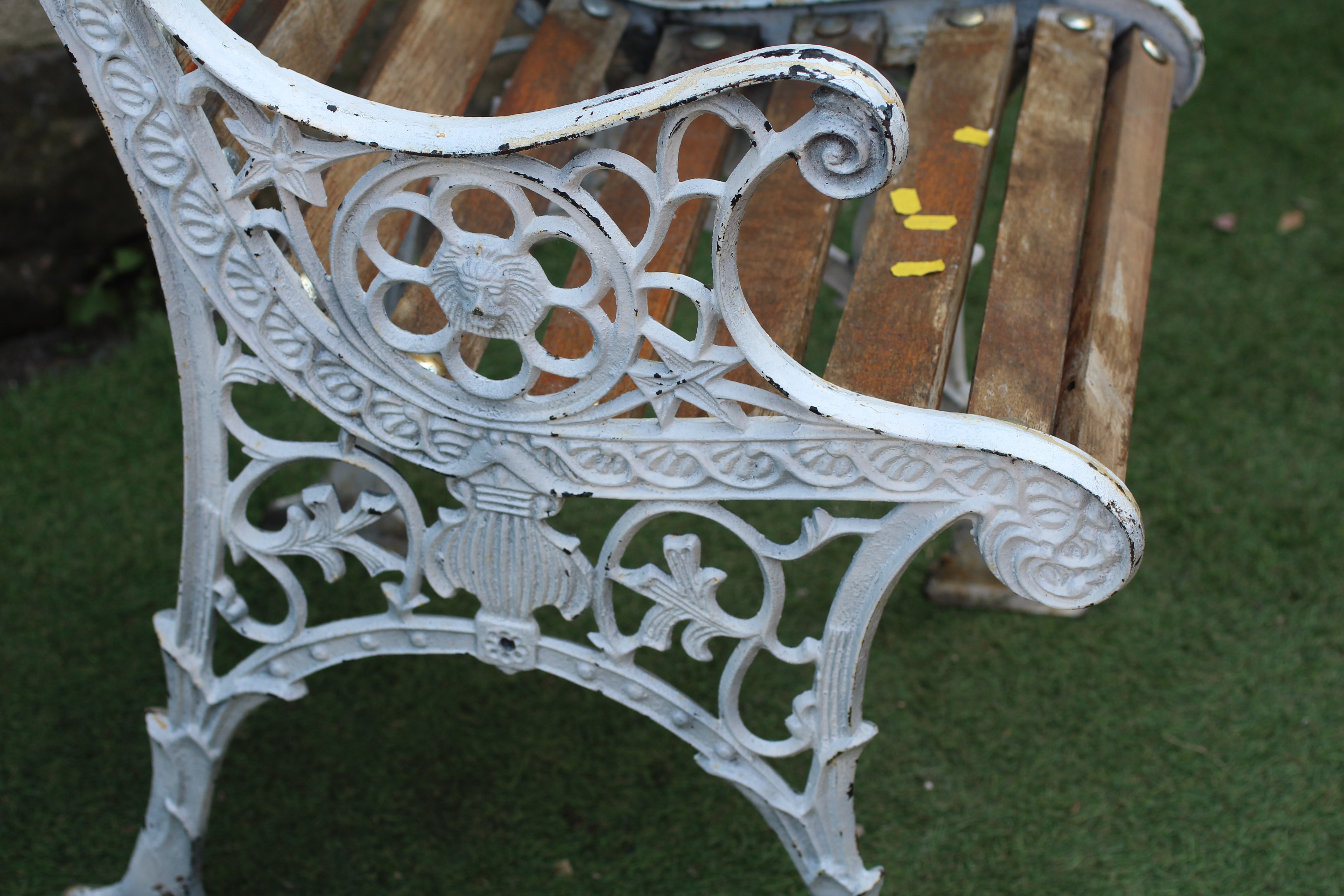A CAST METAL ARMCHAIR Image