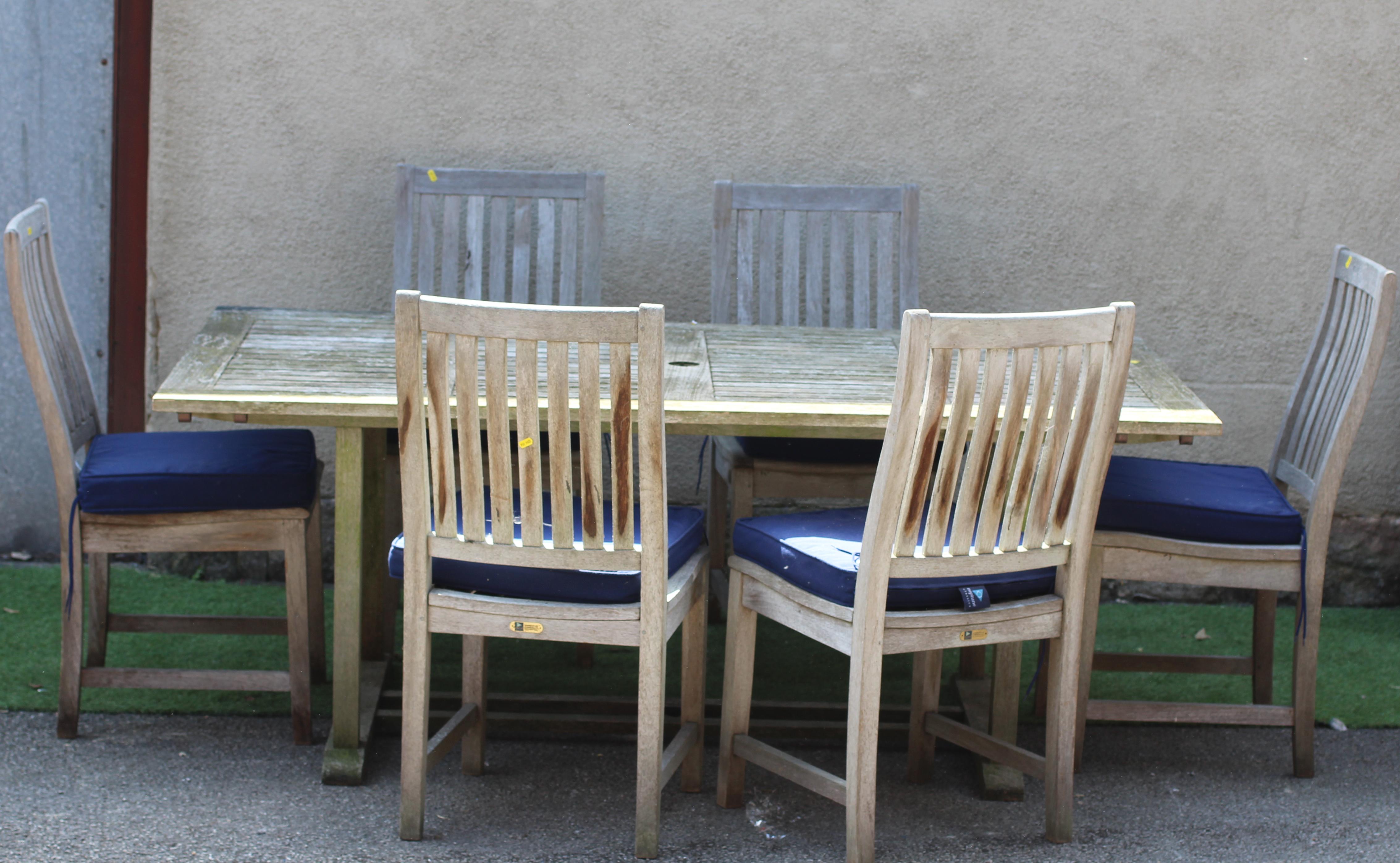 A NEPTUNE SLATTED HARDWOOD DINING SUITE Image