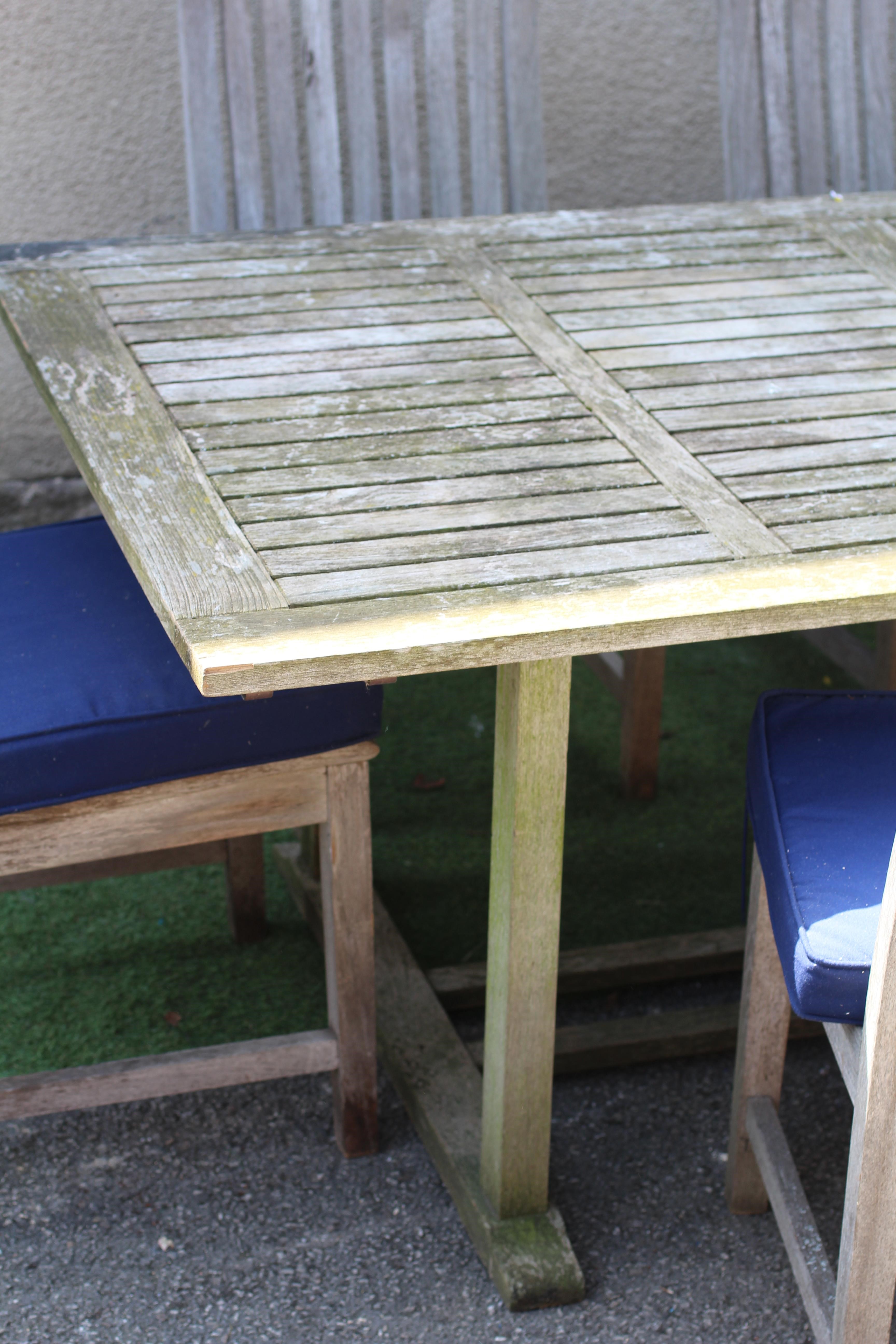 A NEPTUNE SLATTED HARDWOOD DINING SUITE Image