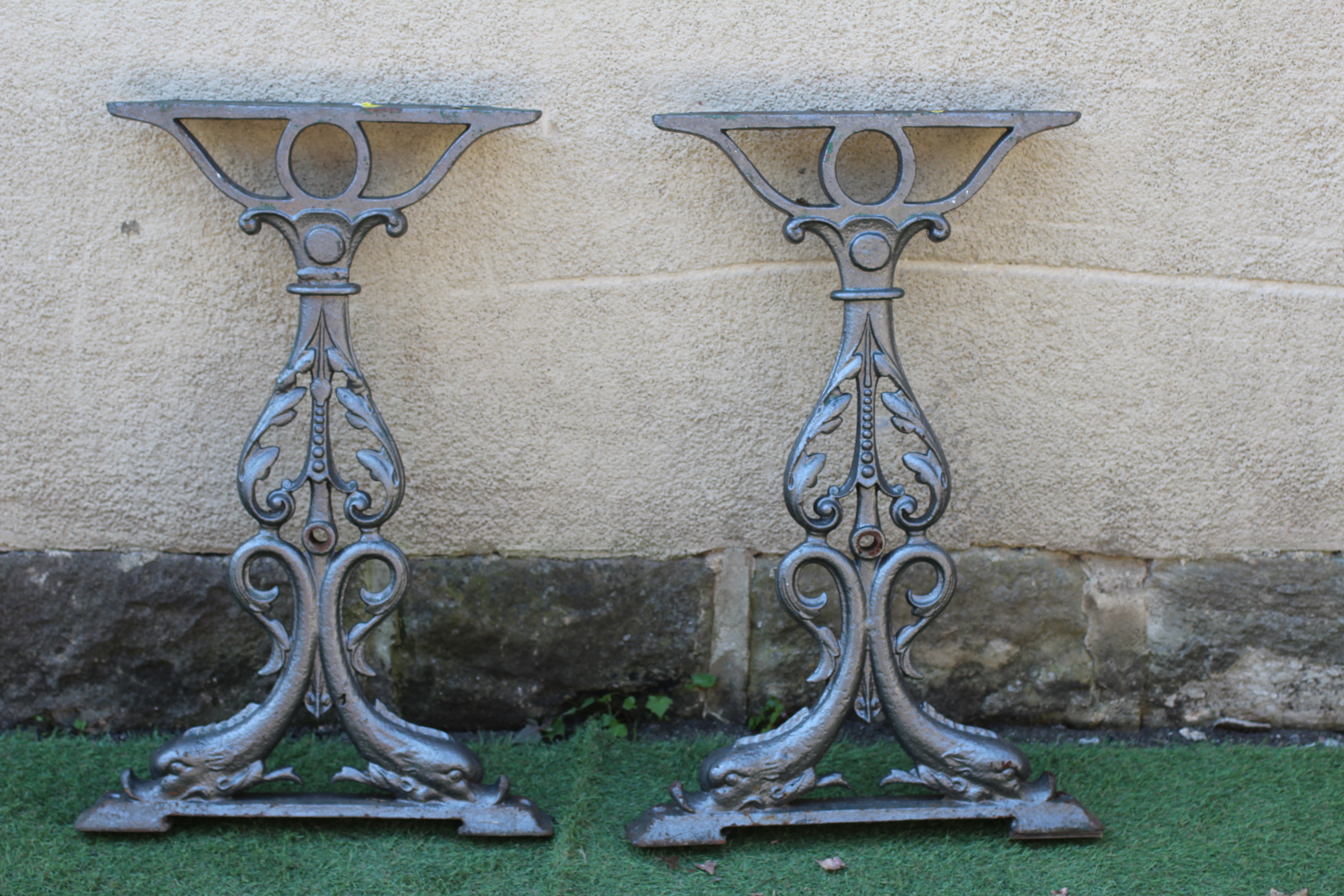 A PAIR OF VICTORIAN CAST IRON TABLE SUPPORTS, late 19th century, of pierced leaf cast lyre form with Image