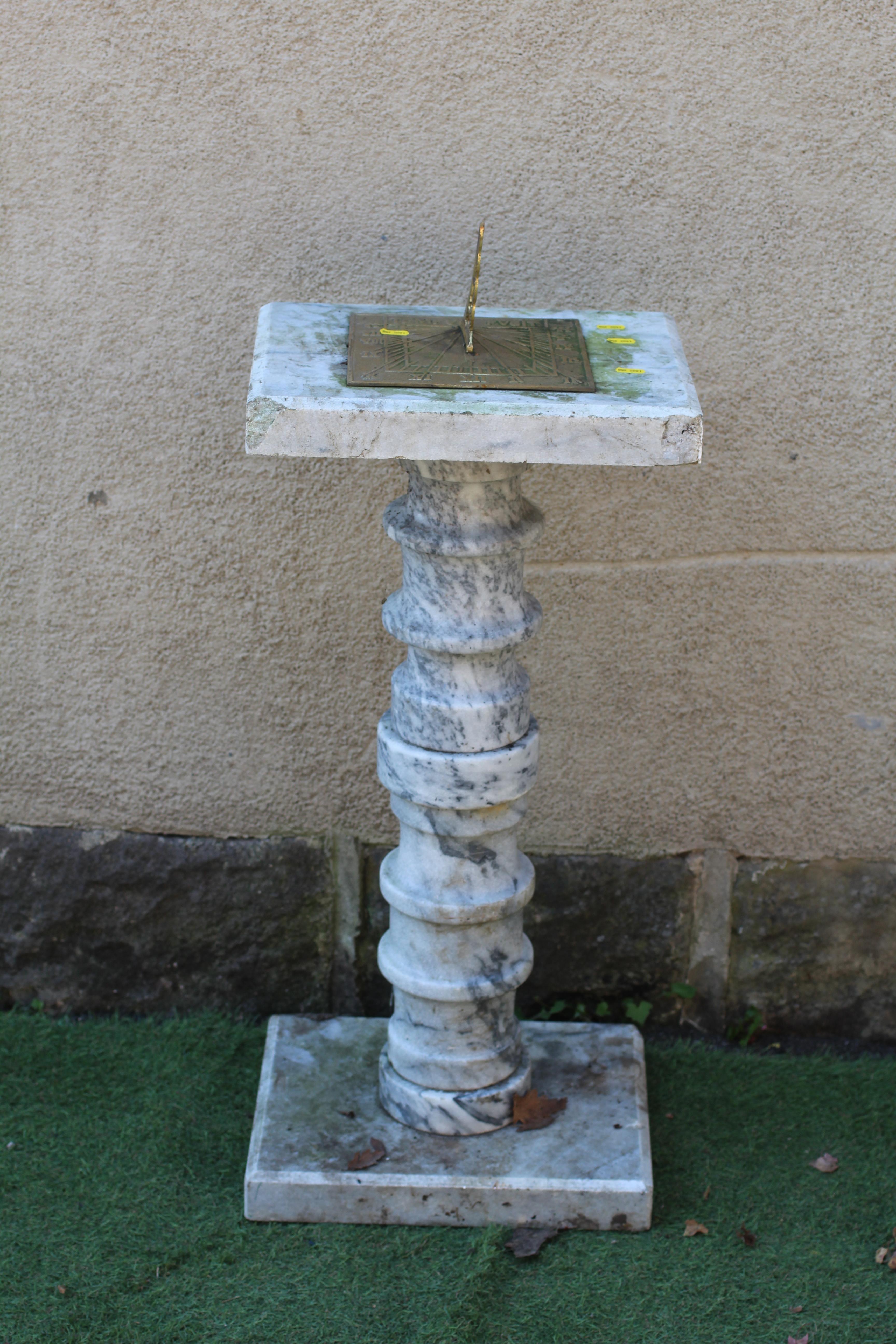 A WHITE MARBLE SQUARE SUNDIAL with baluster turned veined stem and gilded metal gnomon, 15" w x 12" Image