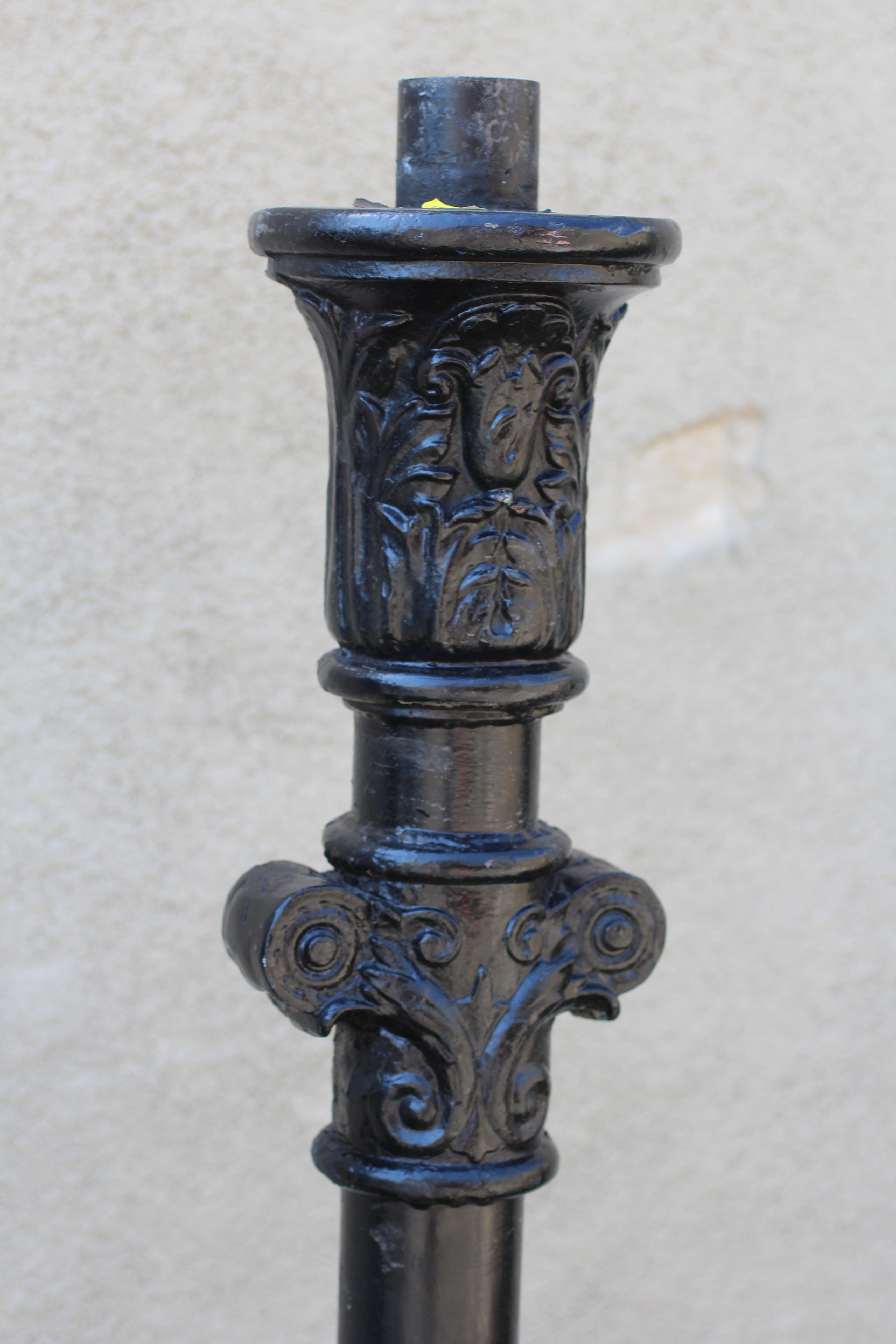 A PAIR OF VICTORIAN STYLE CAST ALLOY LAMP POSTS, lacking hoods, the tubular stem with leaf and Image