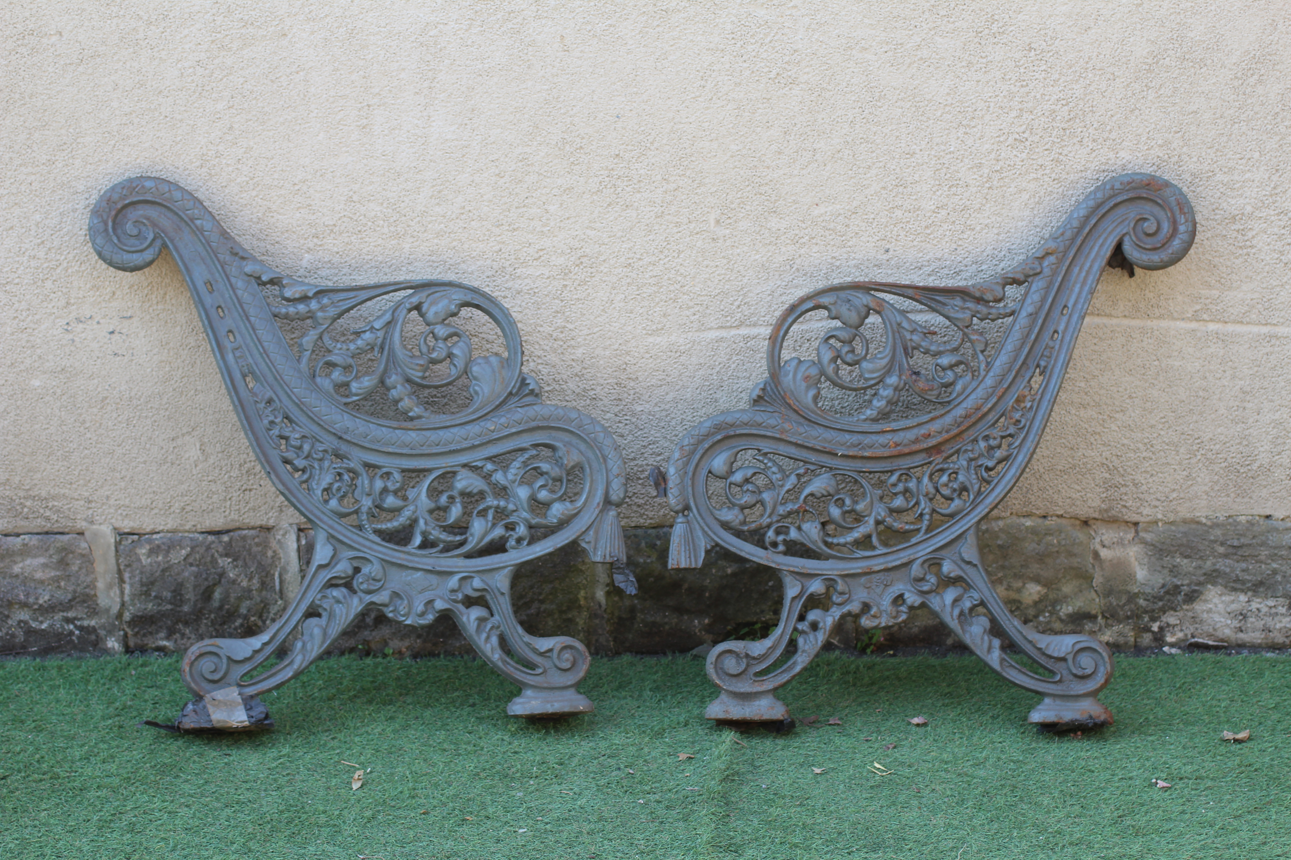 A PAIR OF VICTORIAN CAST IRON BENCH ENDS Image