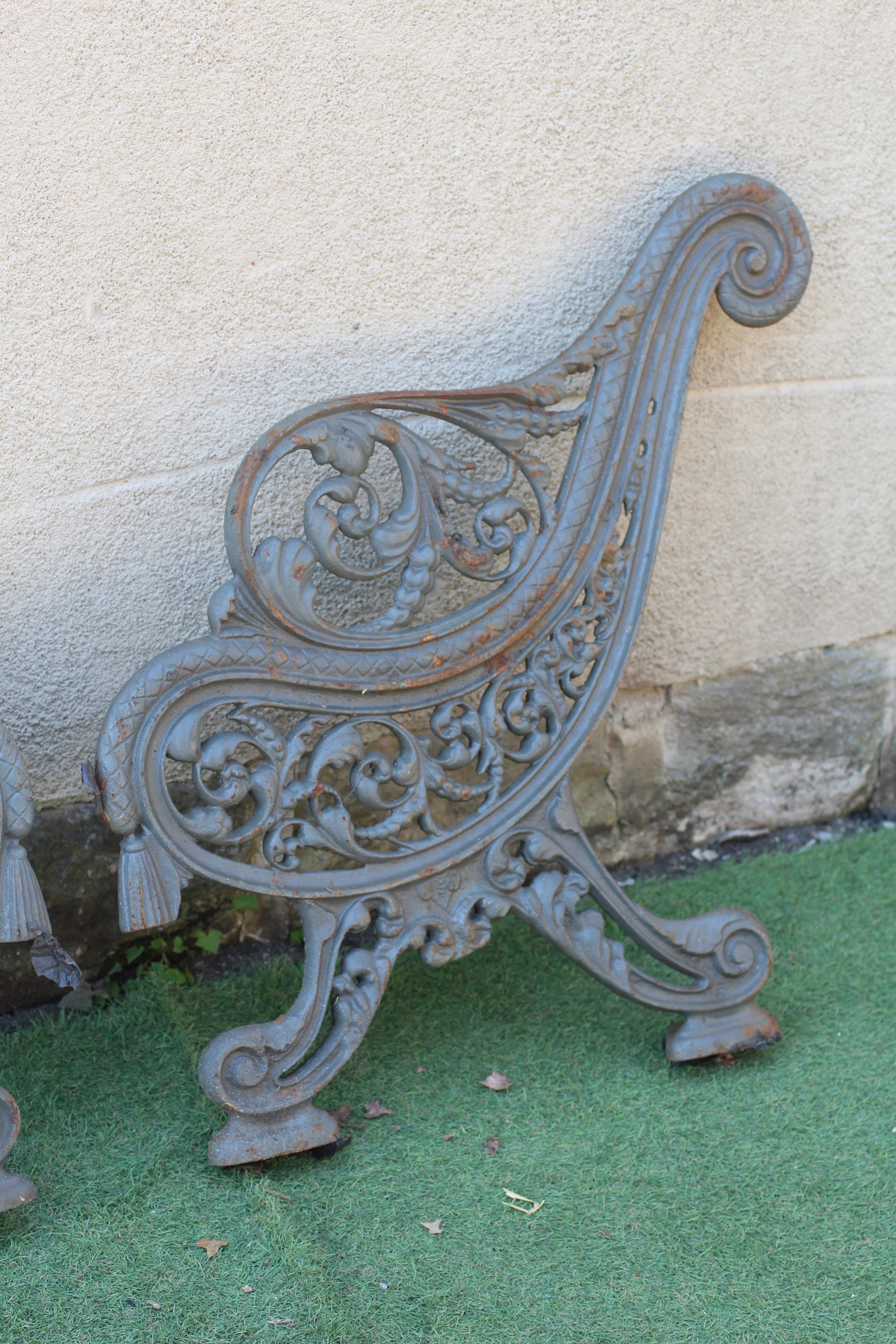 A PAIR OF VICTORIAN CAST IRON BENCH ENDS Image