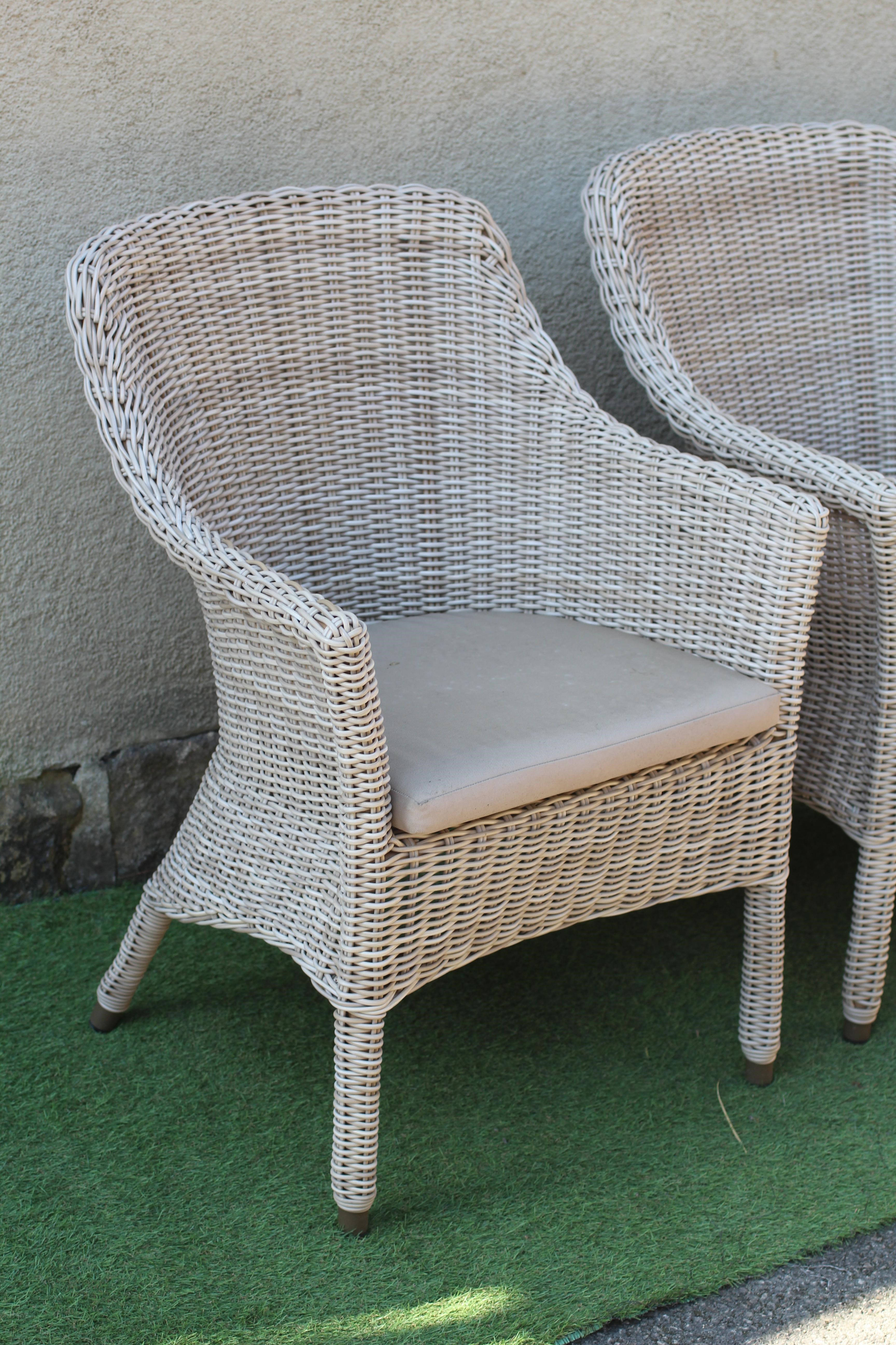 A SET OF FOUR ALUMINIUM FRAMED WOVEN "WICKER" ARMCHAIRS Image