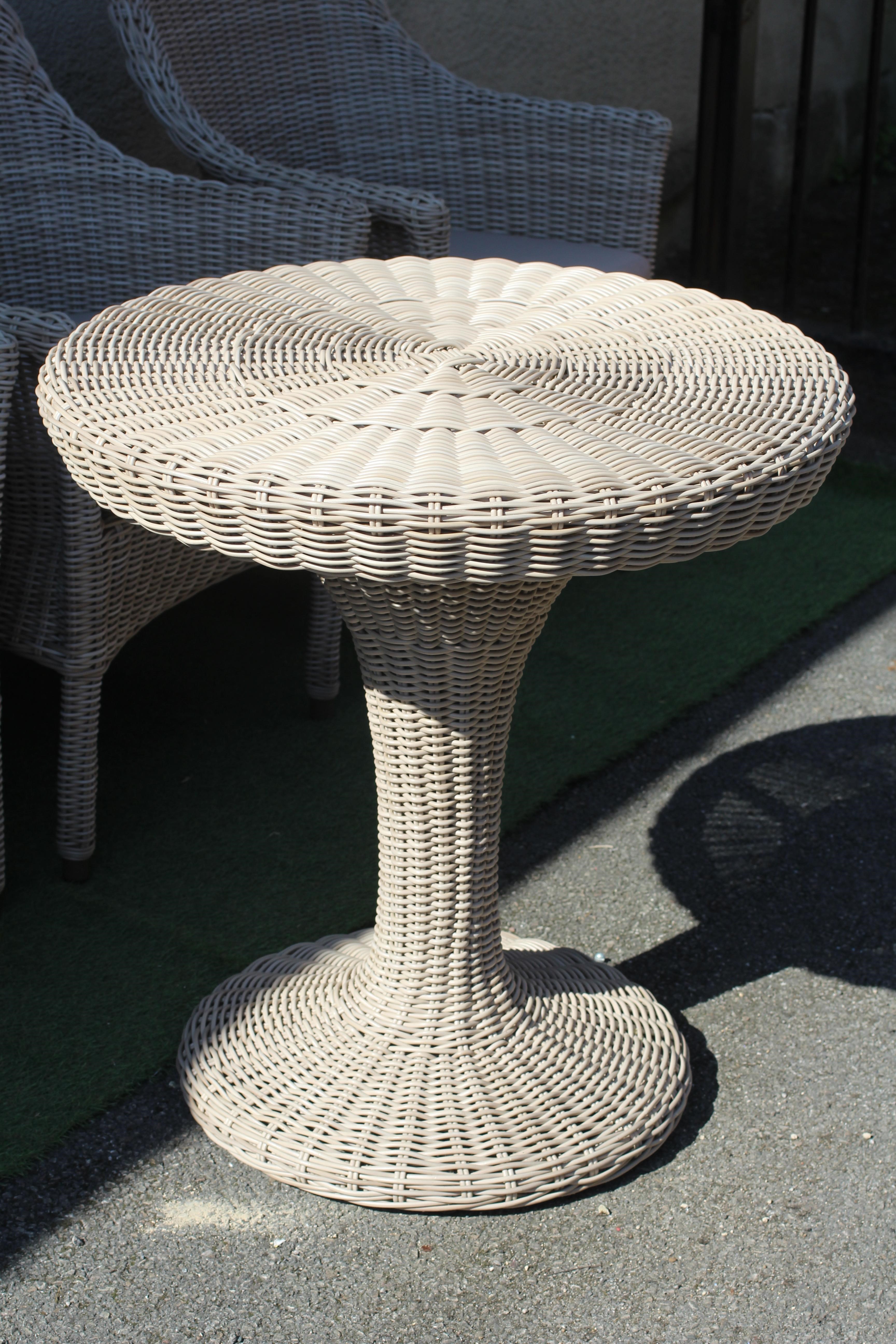 A SET OF FOUR ALUMINIUM FRAMED WOVEN "WICKER" ARMCHAIRS Image