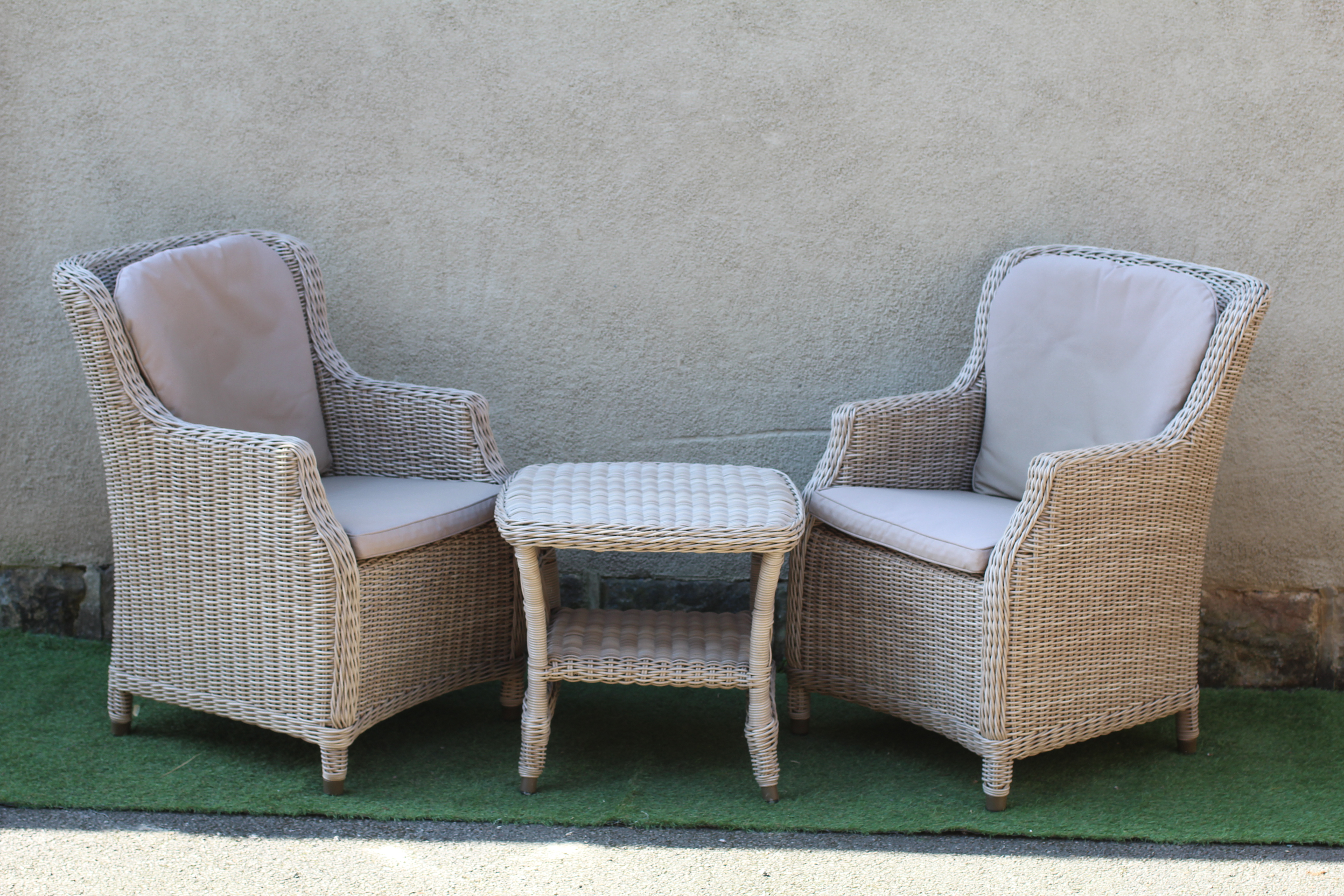 A PAIR OF ALUMINIUM FRAMED "WICKER" ARMCHAIRS Image