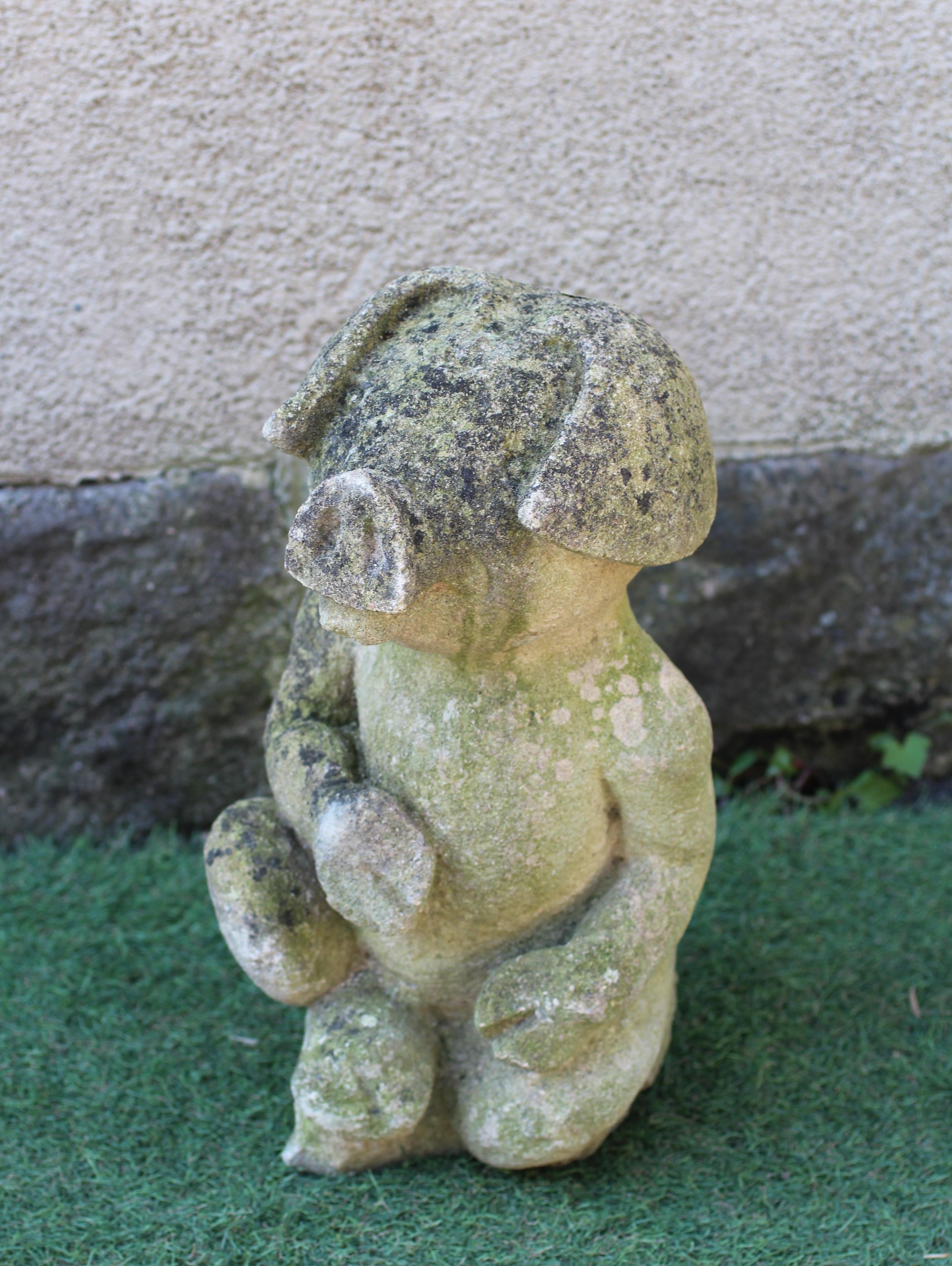 A CARVED SANDSTONE FIGURE OF A SEATED PIG on a square base, 8" w x 16" h Image