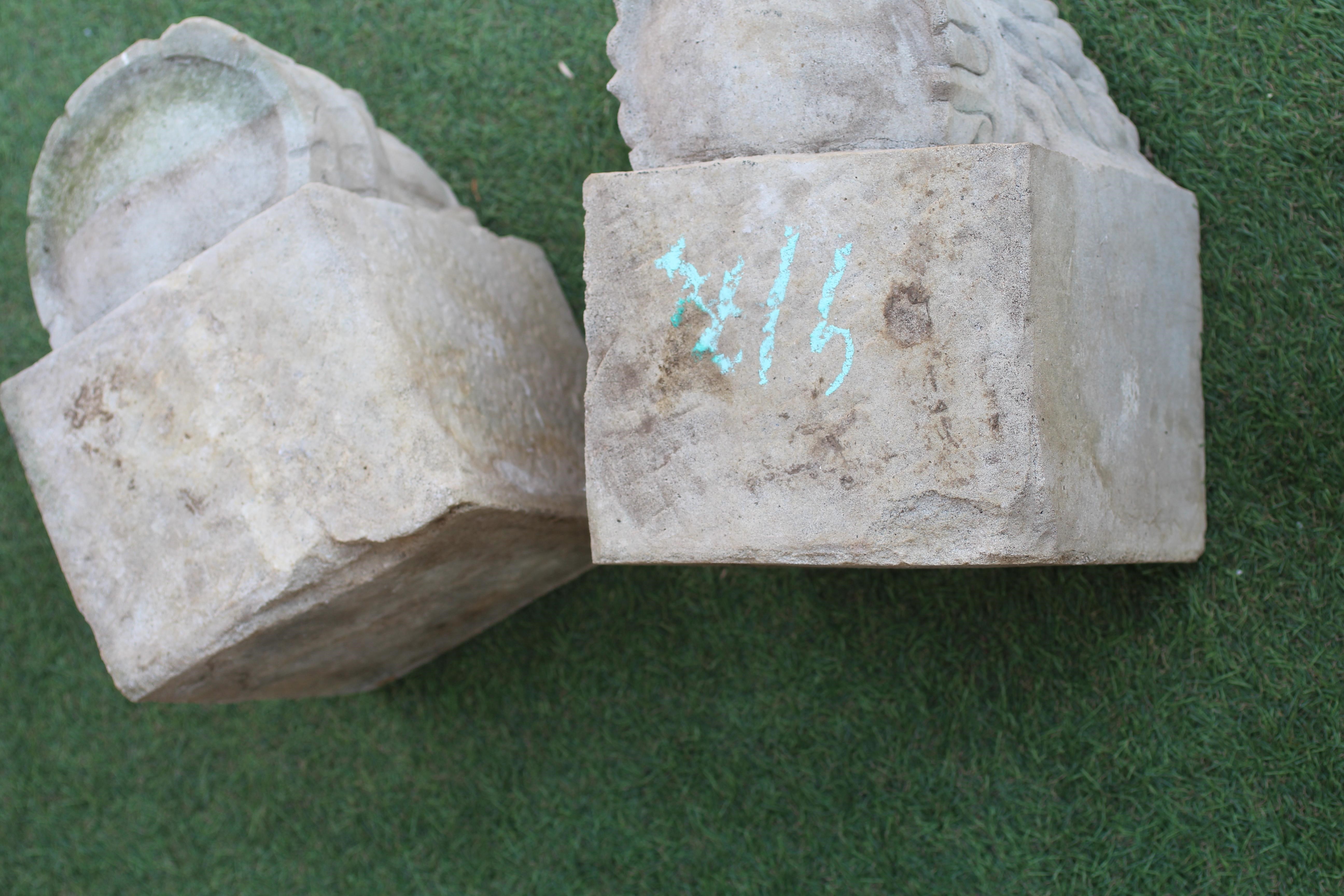 A PAIR OF CAST STONE CORBELS depicting the head of a king and queen, on oblong base, 8 1/2" w x 11 Image