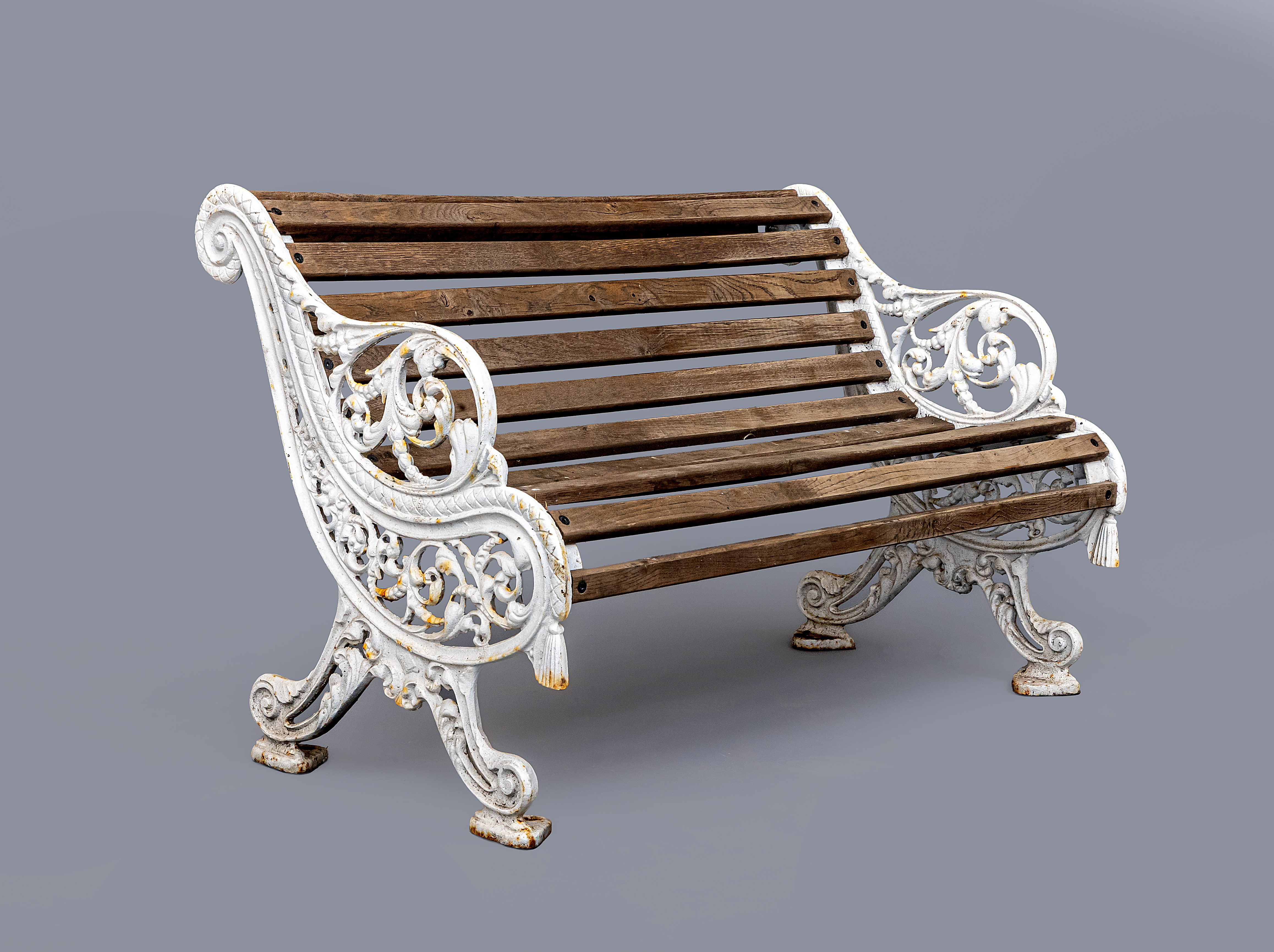 A VICTORIAN CAST IRON PARK BENCH Image