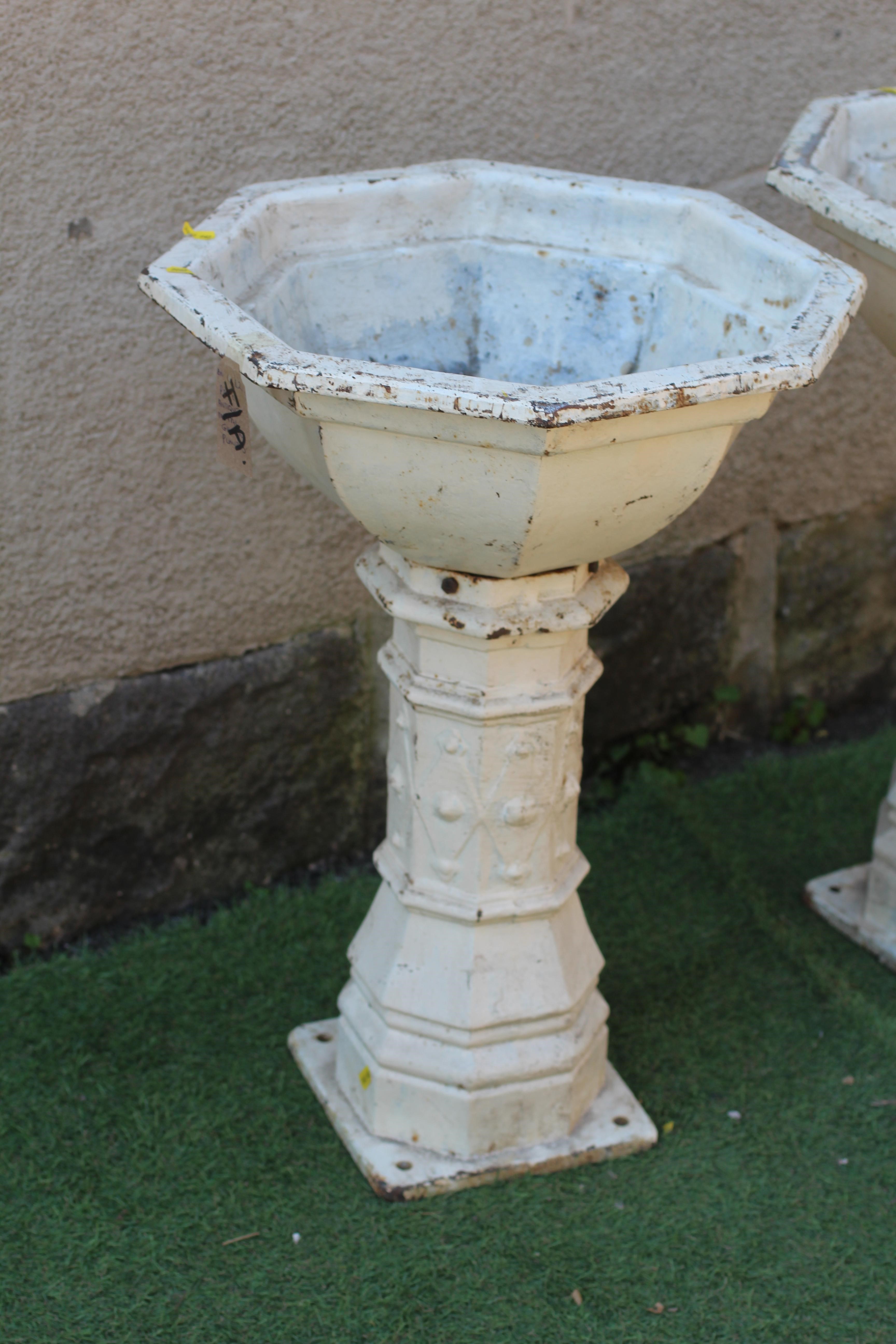 A PAIR OF VICTORIAN GOTHIC CAST IRON OCTAGONAL PLANTERS, the plain bowl on faceted diamond banded Image
