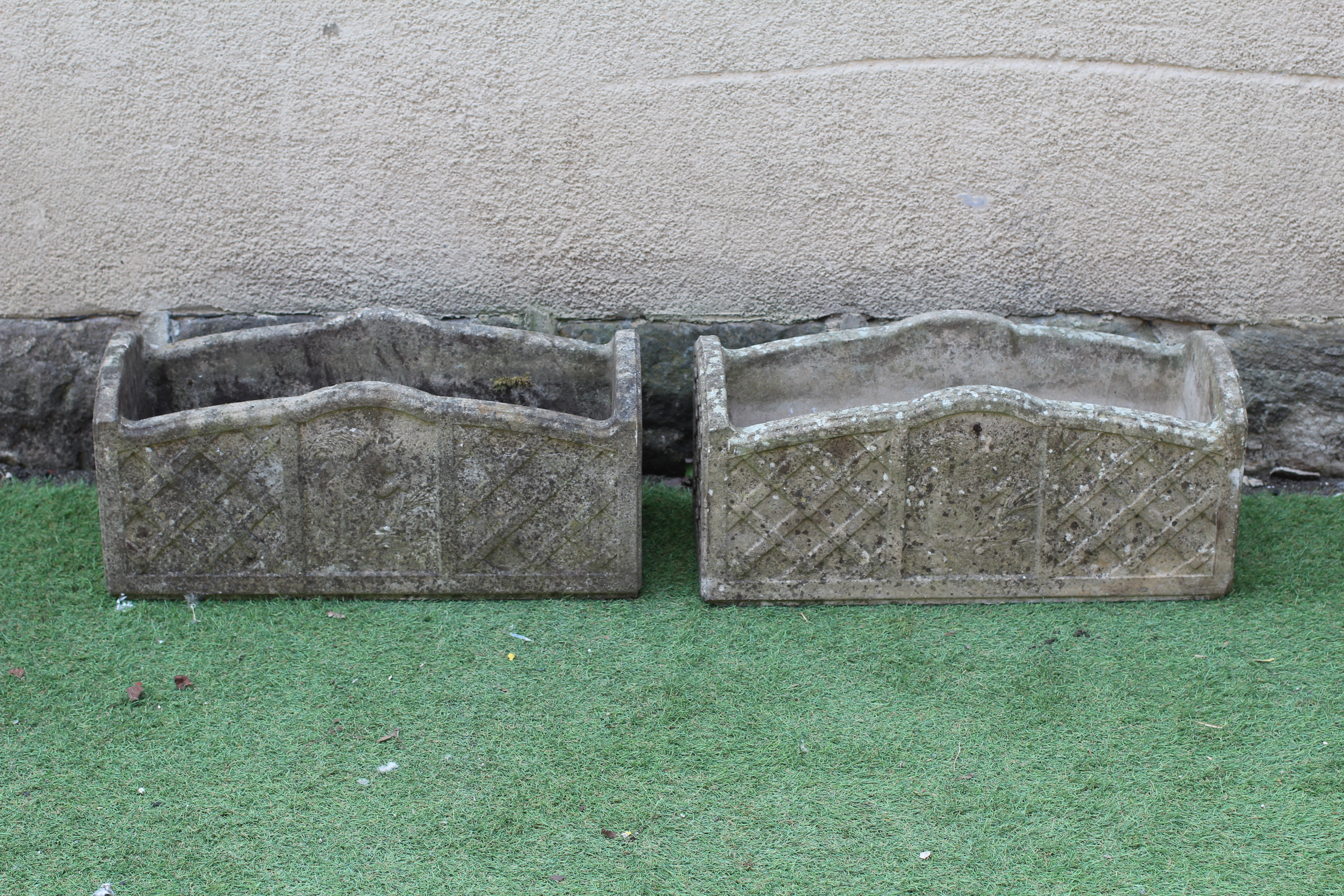 A PAIR OF CAST STONE OBLONG PLANTERS, Image
