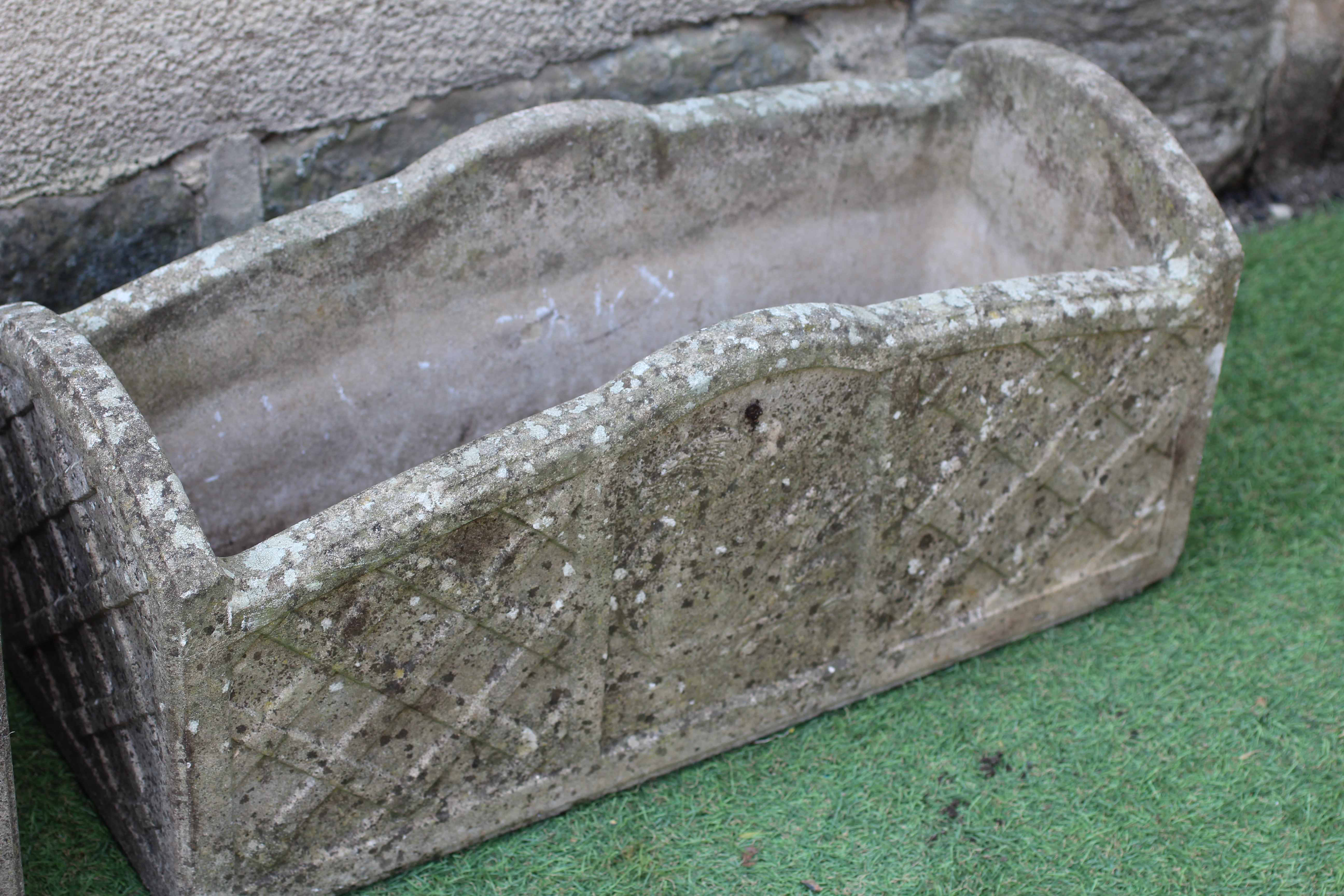 A PAIR OF CAST STONE OBLONG PLANTERS, Image