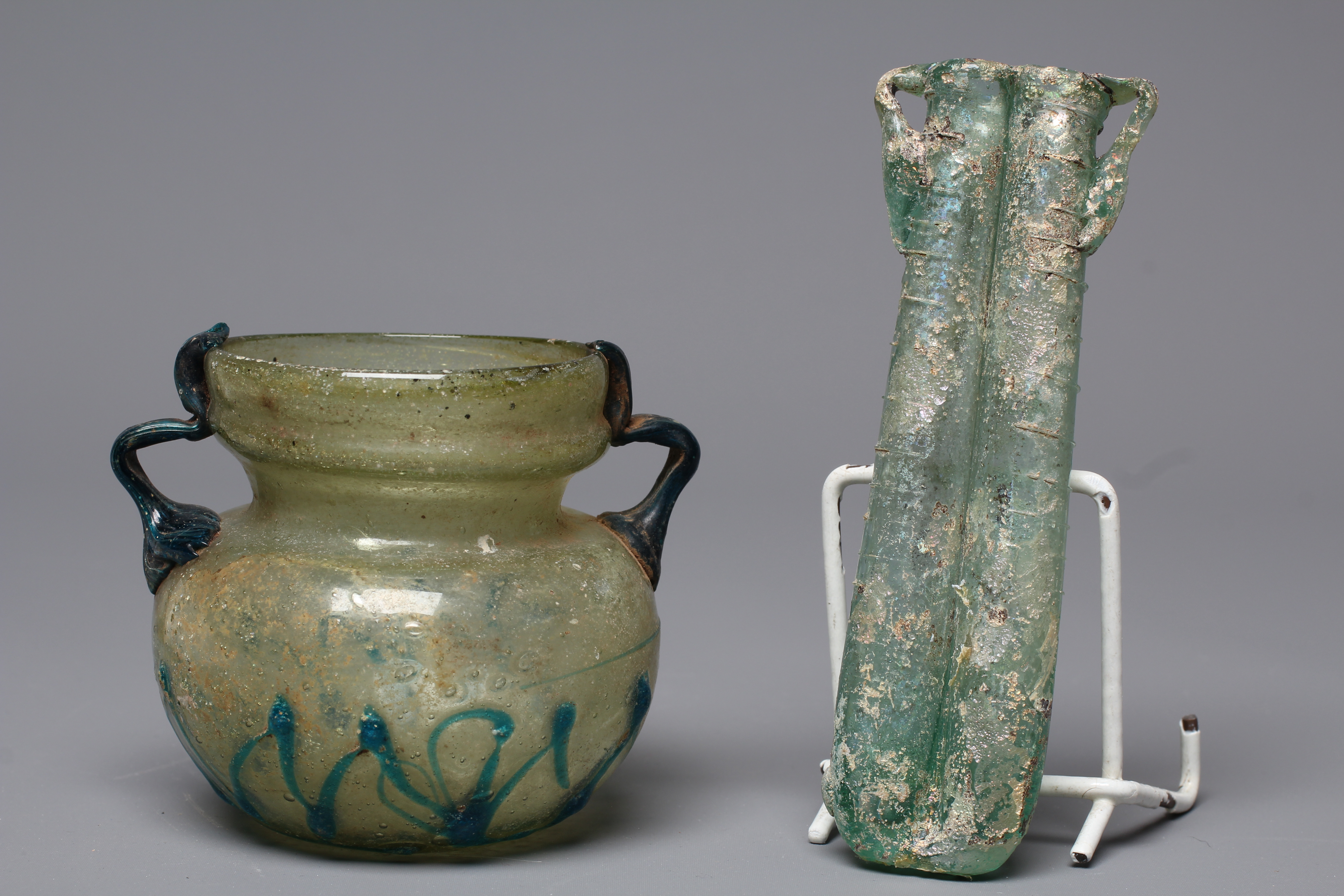 A ROMAN PALE GREEN GLASS BEAKER TYPE BOWL Image