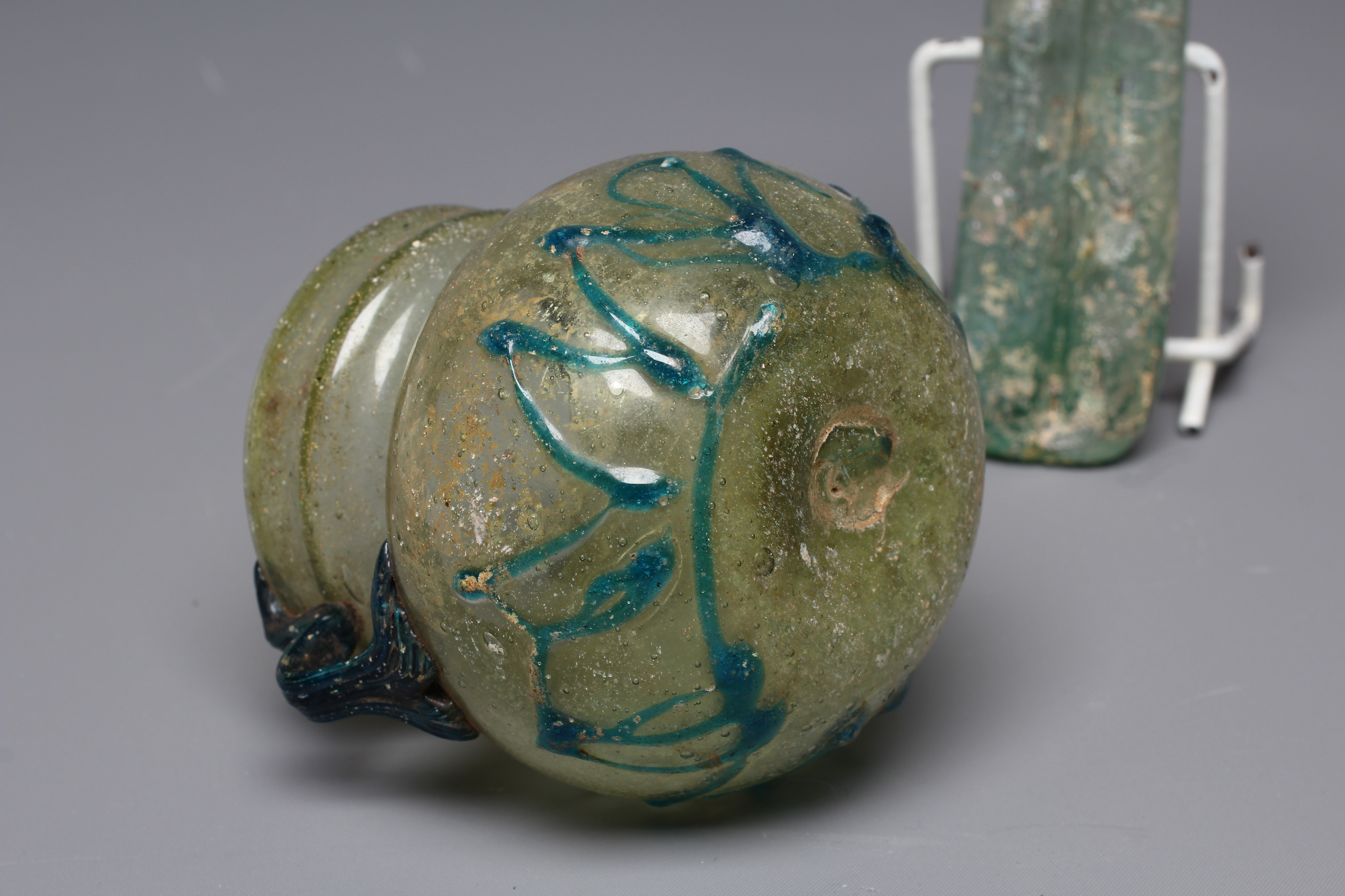 A ROMAN PALE GREEN GLASS BEAKER TYPE BOWL Image