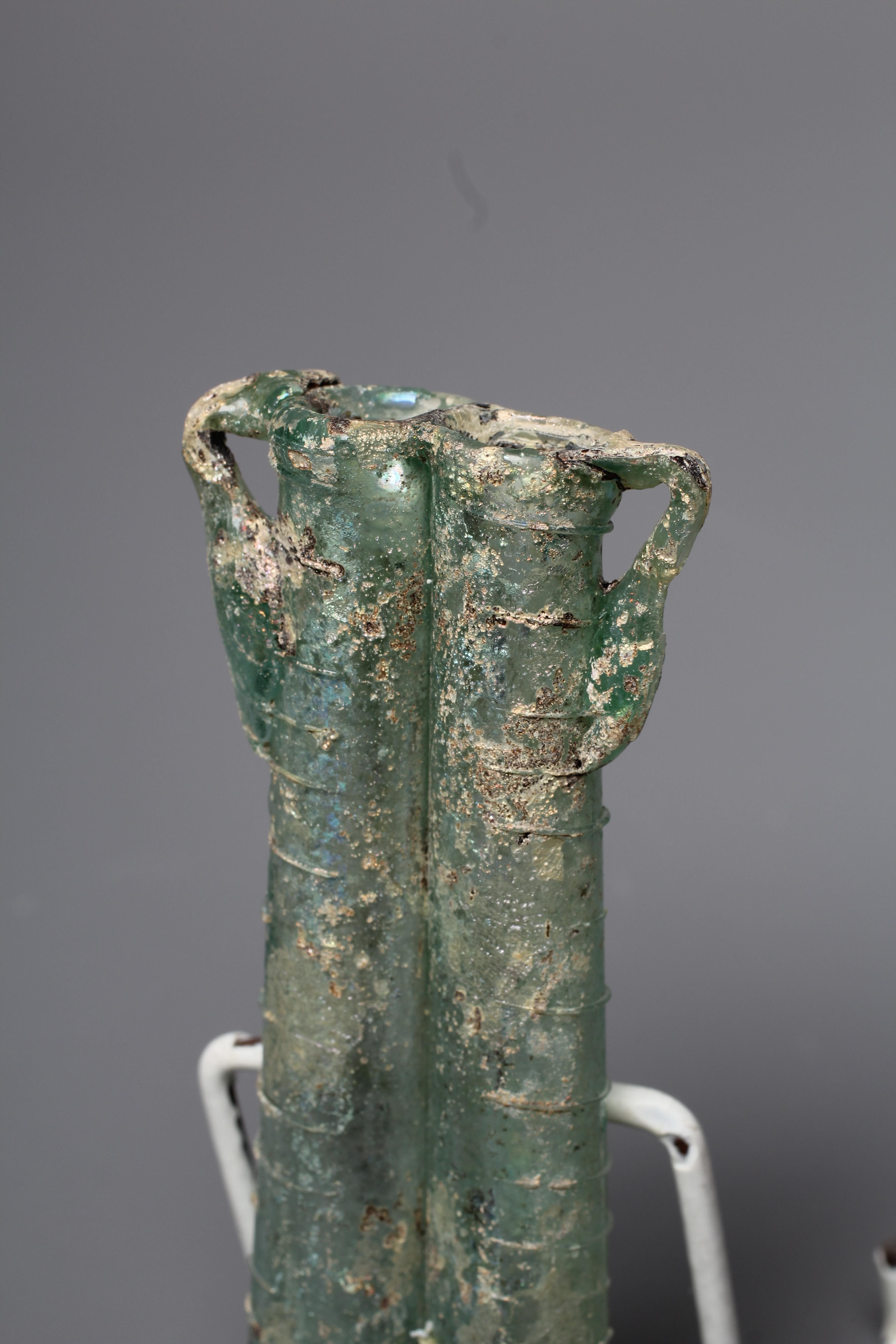 A ROMAN PALE GREEN GLASS BEAKER TYPE BOWL Image