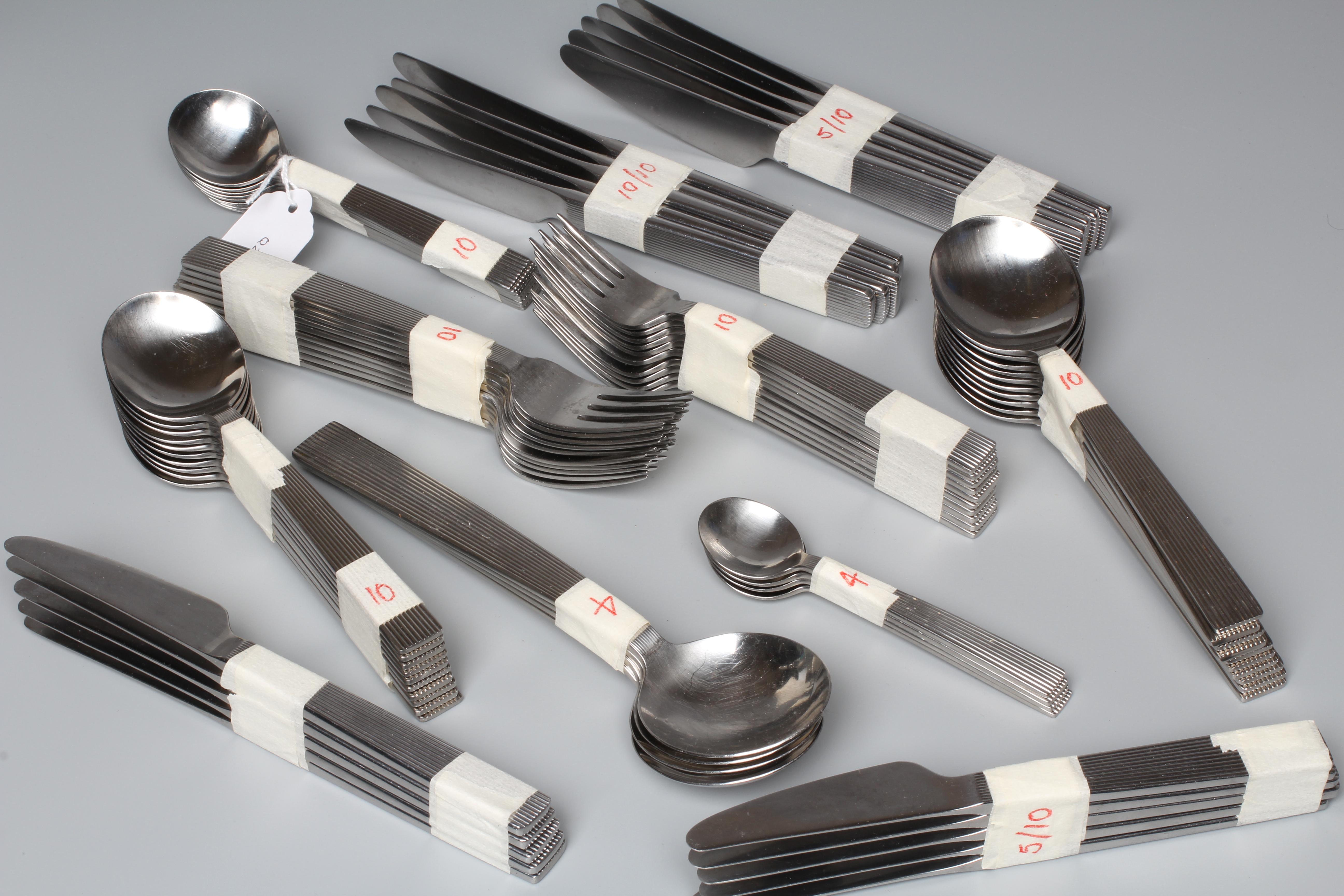 DAVID MELLOR - A STAINLESS STEEL FLUTE PATTERN TABLE SERVICE FOR TEN PLACE SETTINGS Image