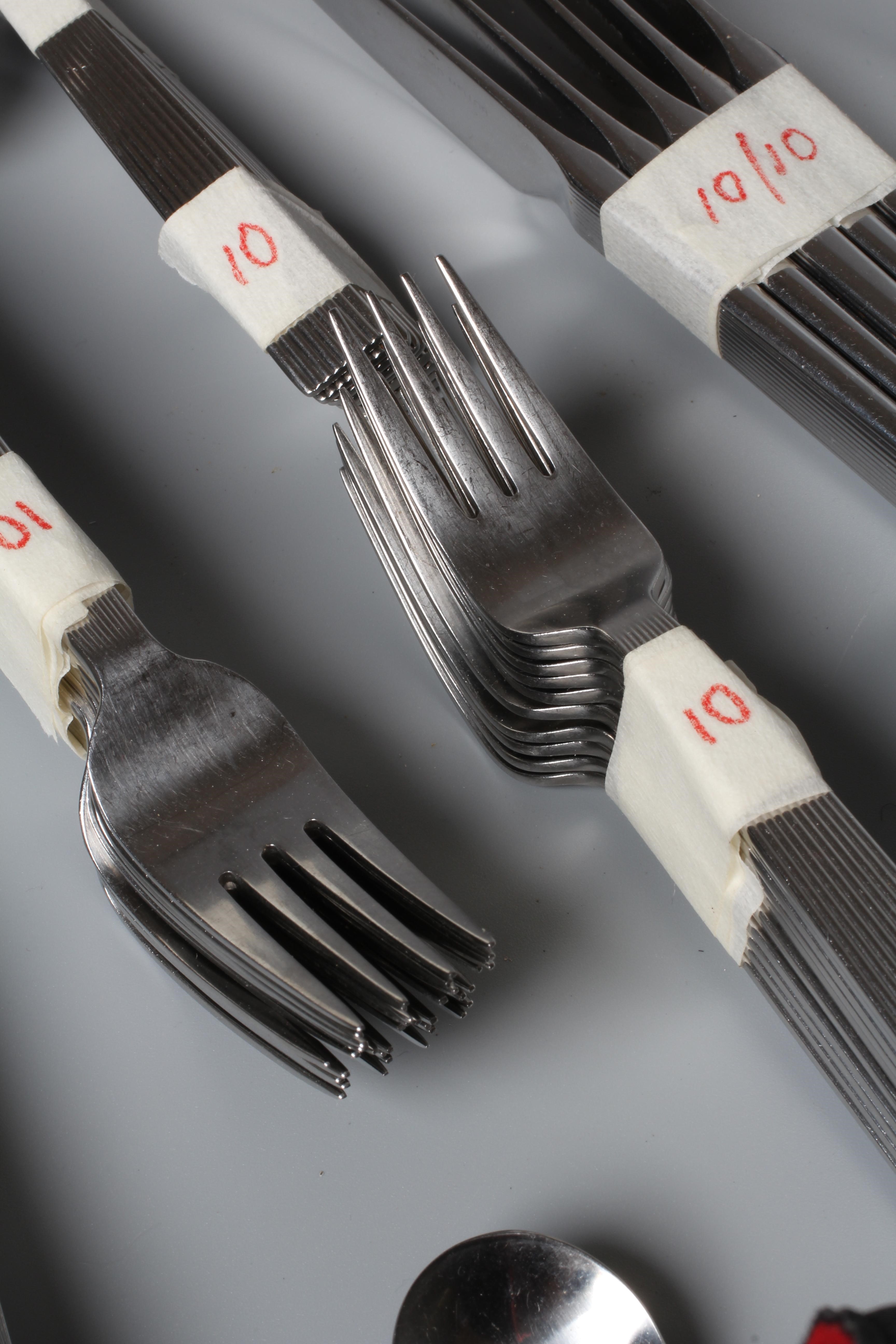 DAVID MELLOR - A STAINLESS STEEL FLUTE PATTERN TABLE SERVICE FOR TEN PLACE SETTINGS Image