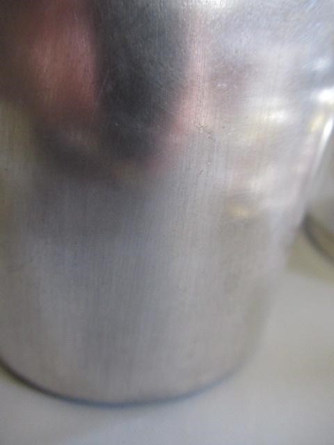 AN ART DECO TORPEDO SHAPED RECIPE COCKTAIL SHAKER by Wilhelm Wolf, the rim with fifteen named Image