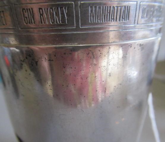 AN ART DECO TORPEDO SHAPED RECIPE COCKTAIL SHAKER by Wilhelm Wolf, the rim with fifteen named Image
