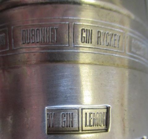AN ART DECO TORPEDO SHAPED RECIPE COCKTAIL SHAKER by Wilhelm Wolf, the rim with fifteen named Image