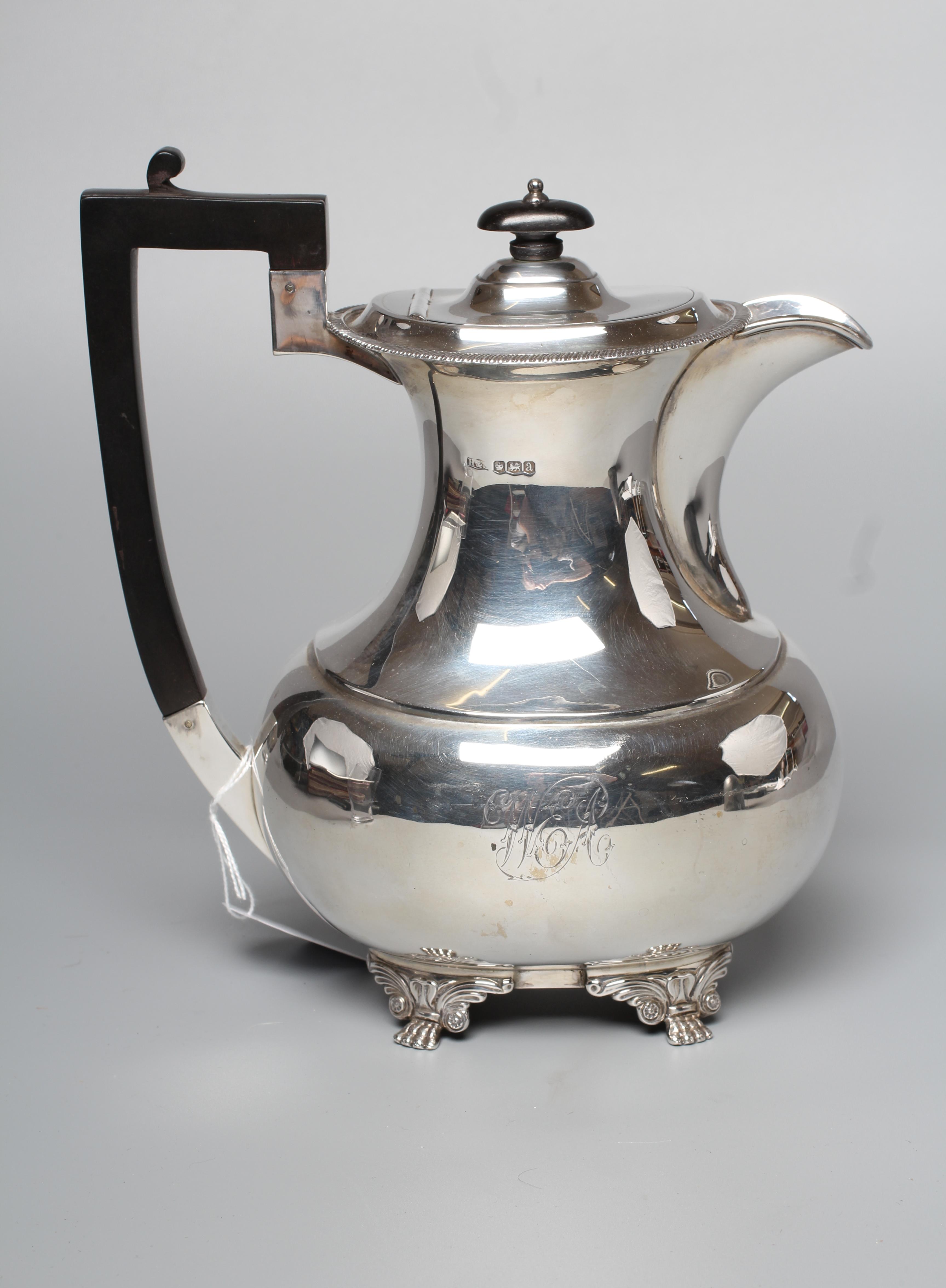 A GEORGE V COFFEE POT by Harrison Bros. Image