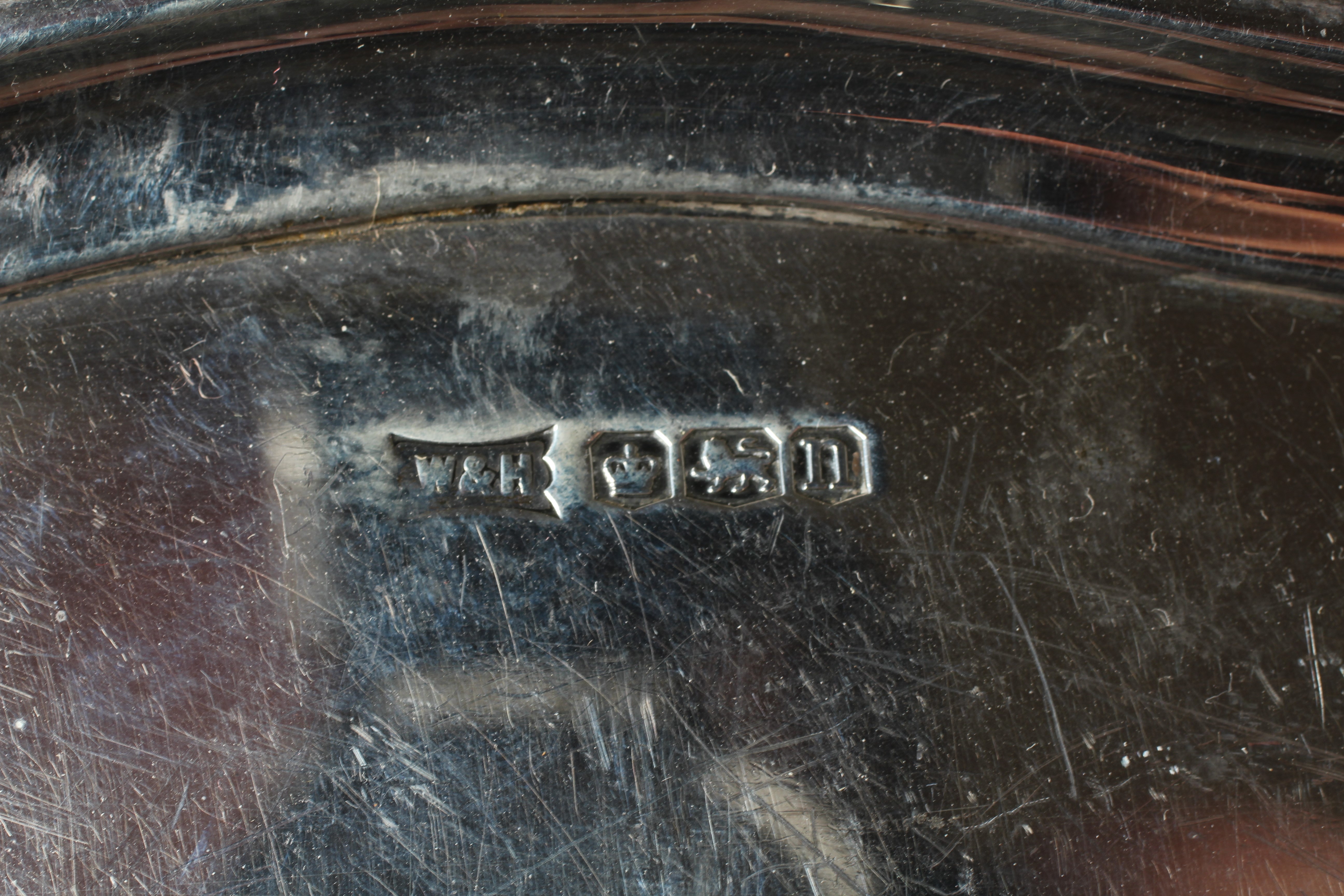 A GEORGE V SALVER by Walker & Hall, Sheffield 1930, of shaped square form with piecrust border, Image