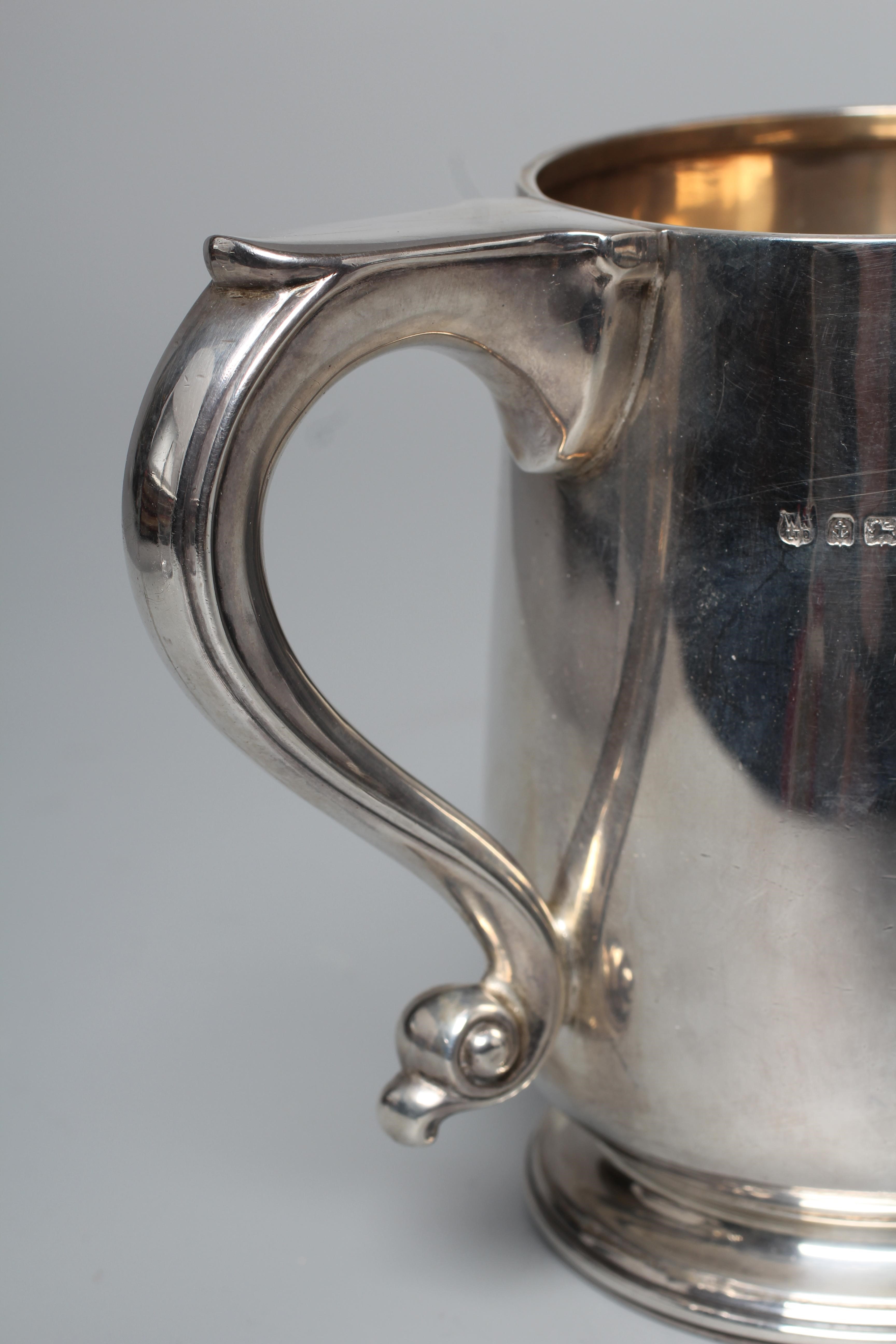 A GEORGE V MUG by William Neale & Son Ltd., Birmingham 1925, of rounded cylindrical form with S Image