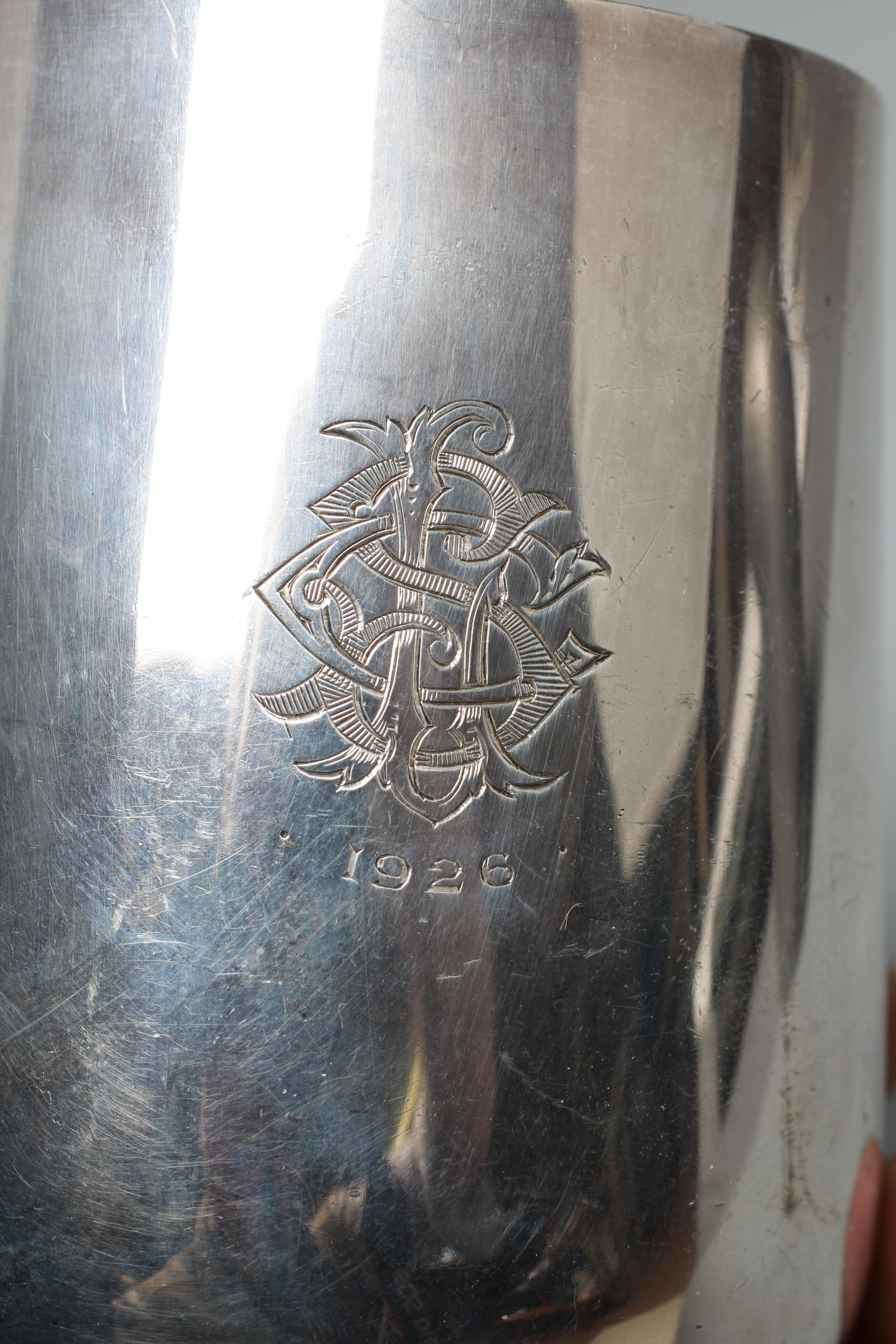 A GEORGE V MUG by William Neale & Son Ltd., Birmingham 1925, of rounded cylindrical form with S Image