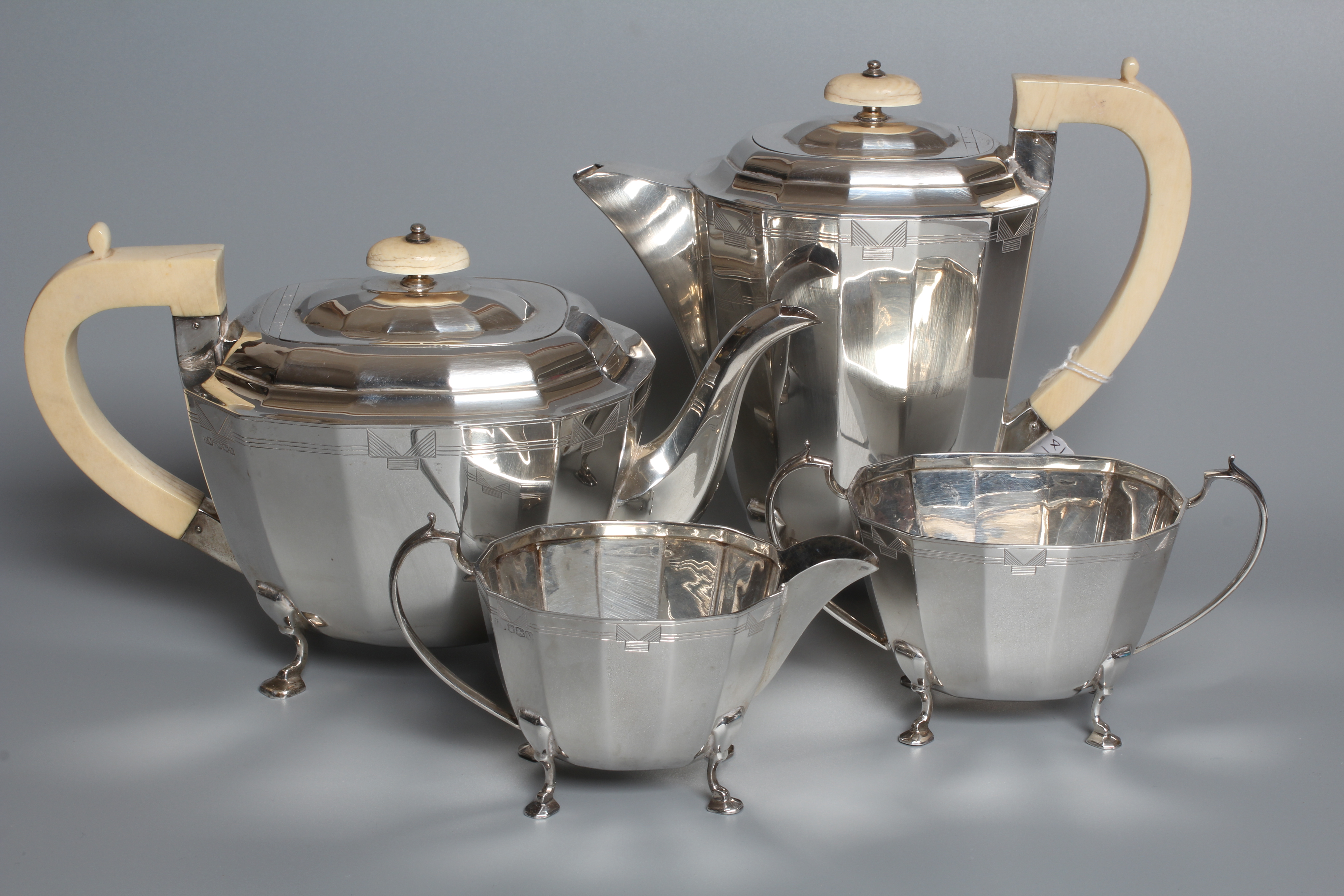 A GEORGE VI FOUR PIECE TEA SERVICE by Viners Image
