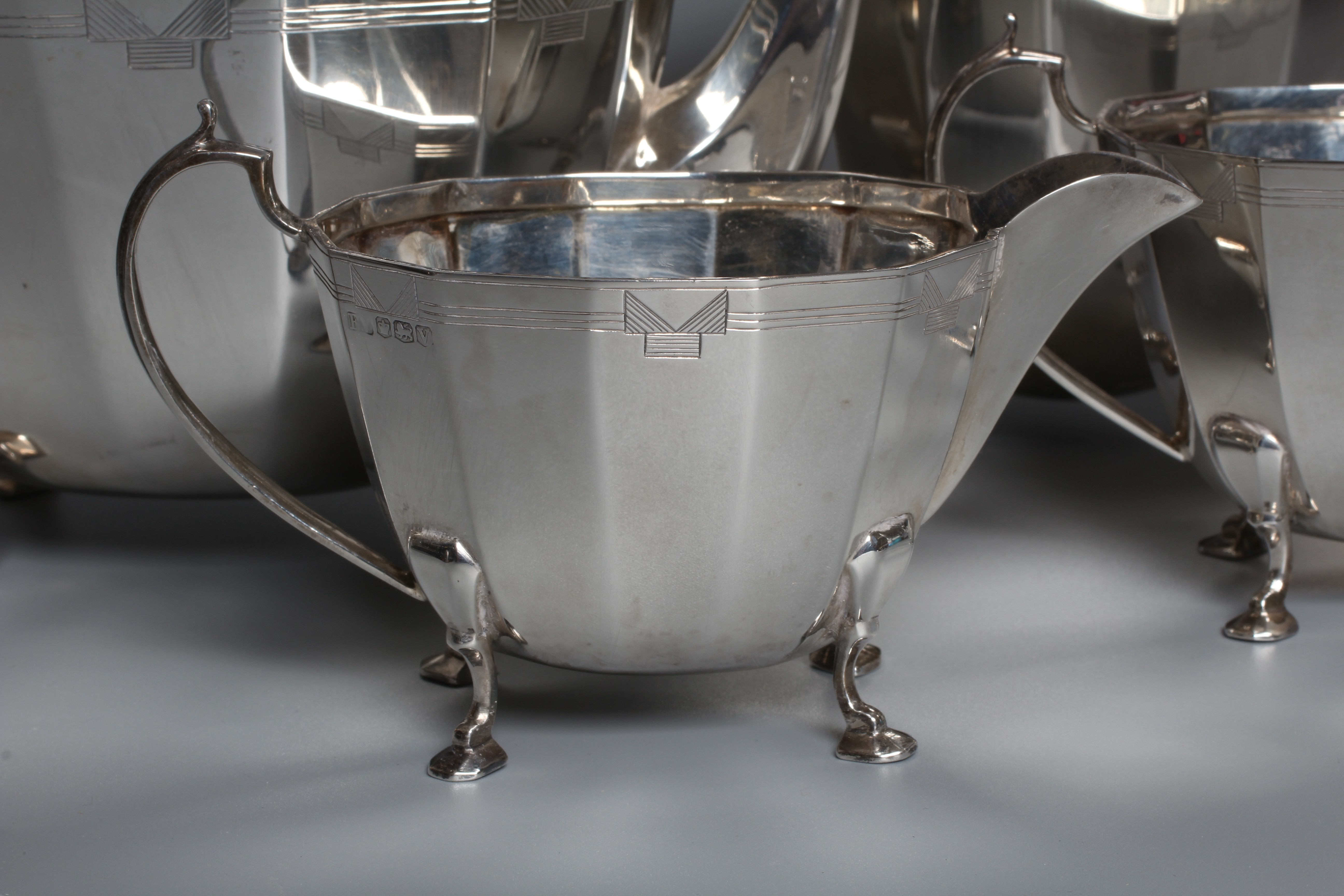 A GEORGE VI FOUR PIECE TEA SERVICE by Viners Image