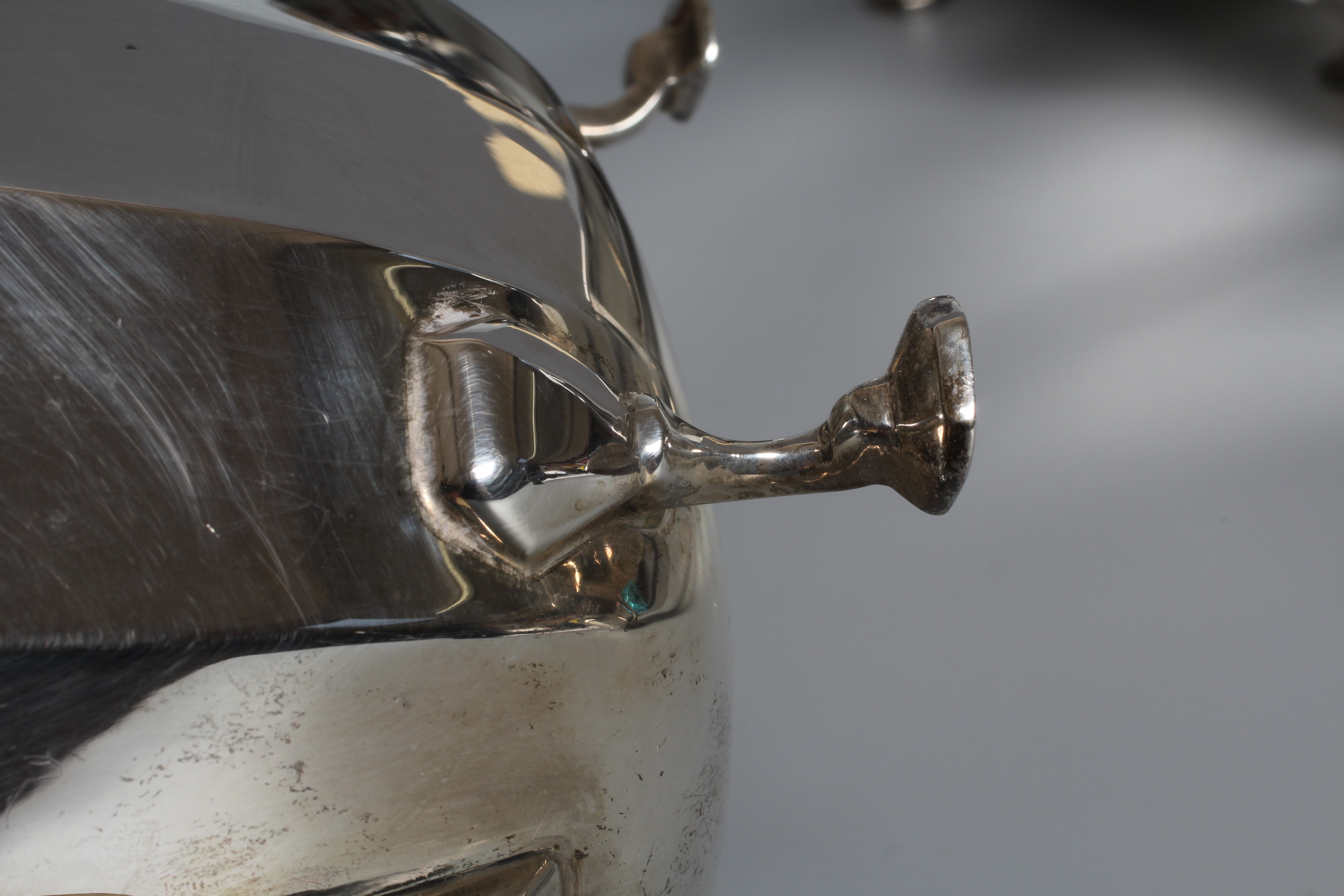 A GEORGE VI FOUR PIECE TEA SERVICE by Viners Image