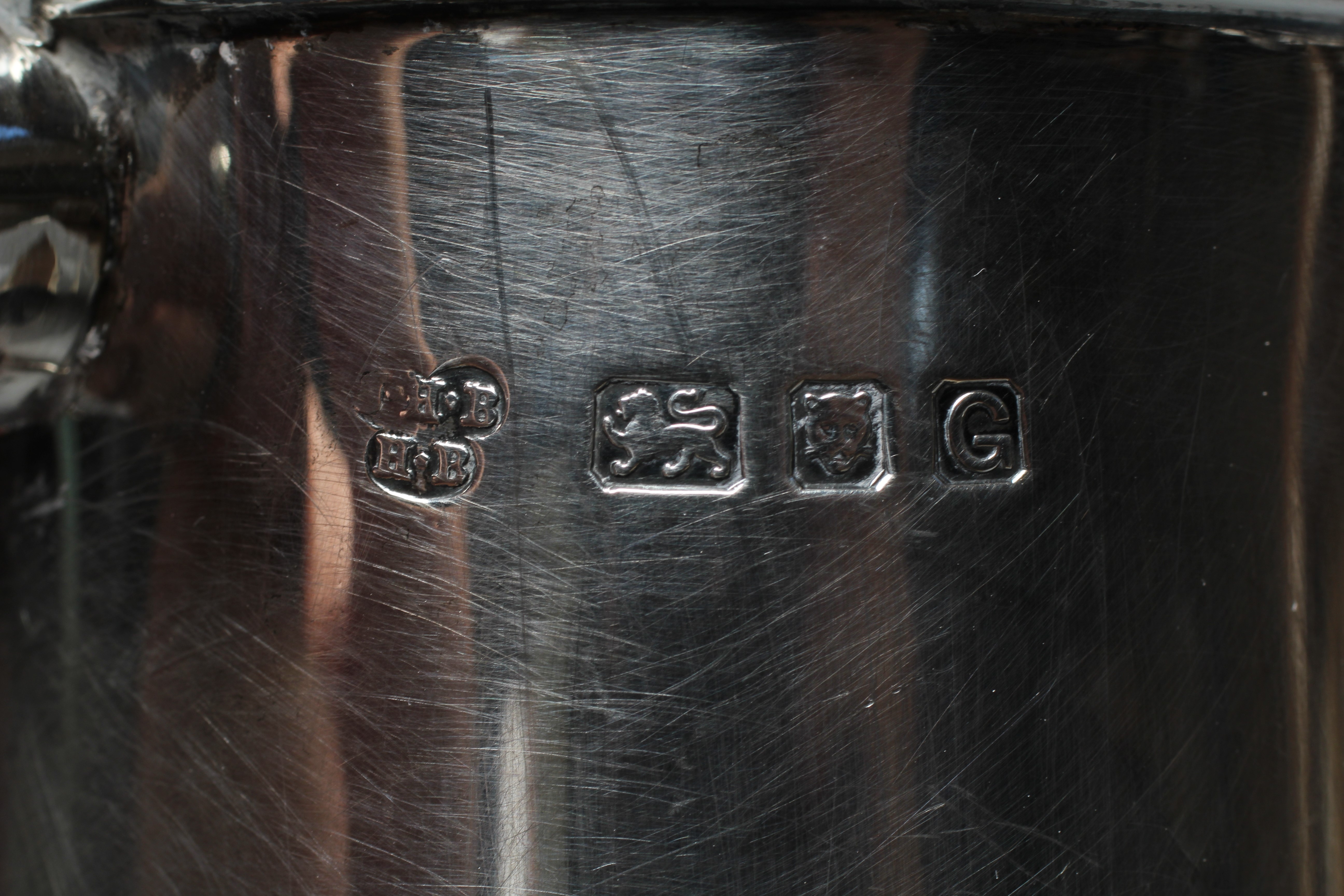 A GEORGE VI HOT WATER JUG by Z Barraclough & Sons, London 1942, of baluster form with hinged high Image