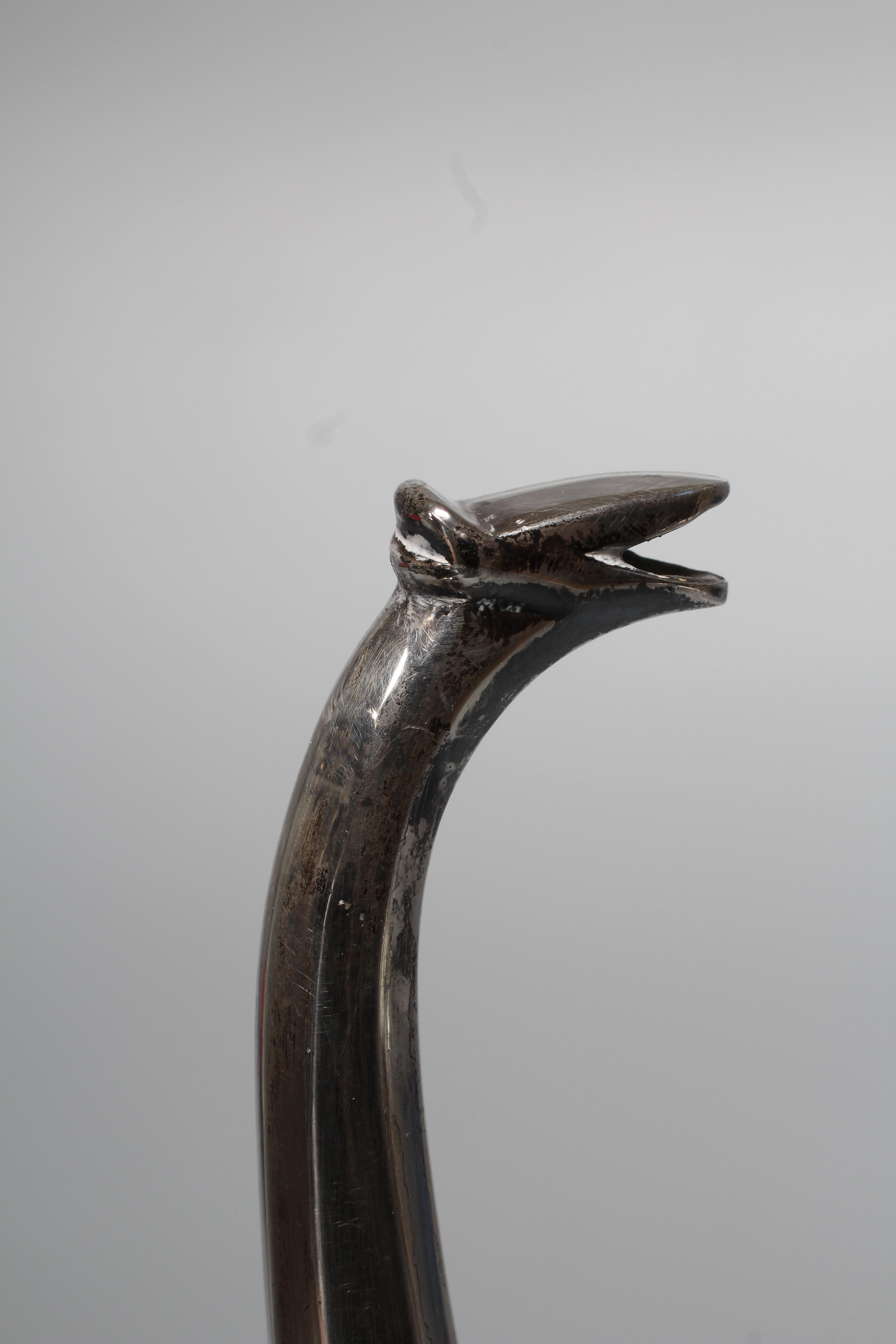 A GEORGE VI HOT WATER JUG by Z Barraclough & Sons, London 1942, of baluster form with hinged high Image