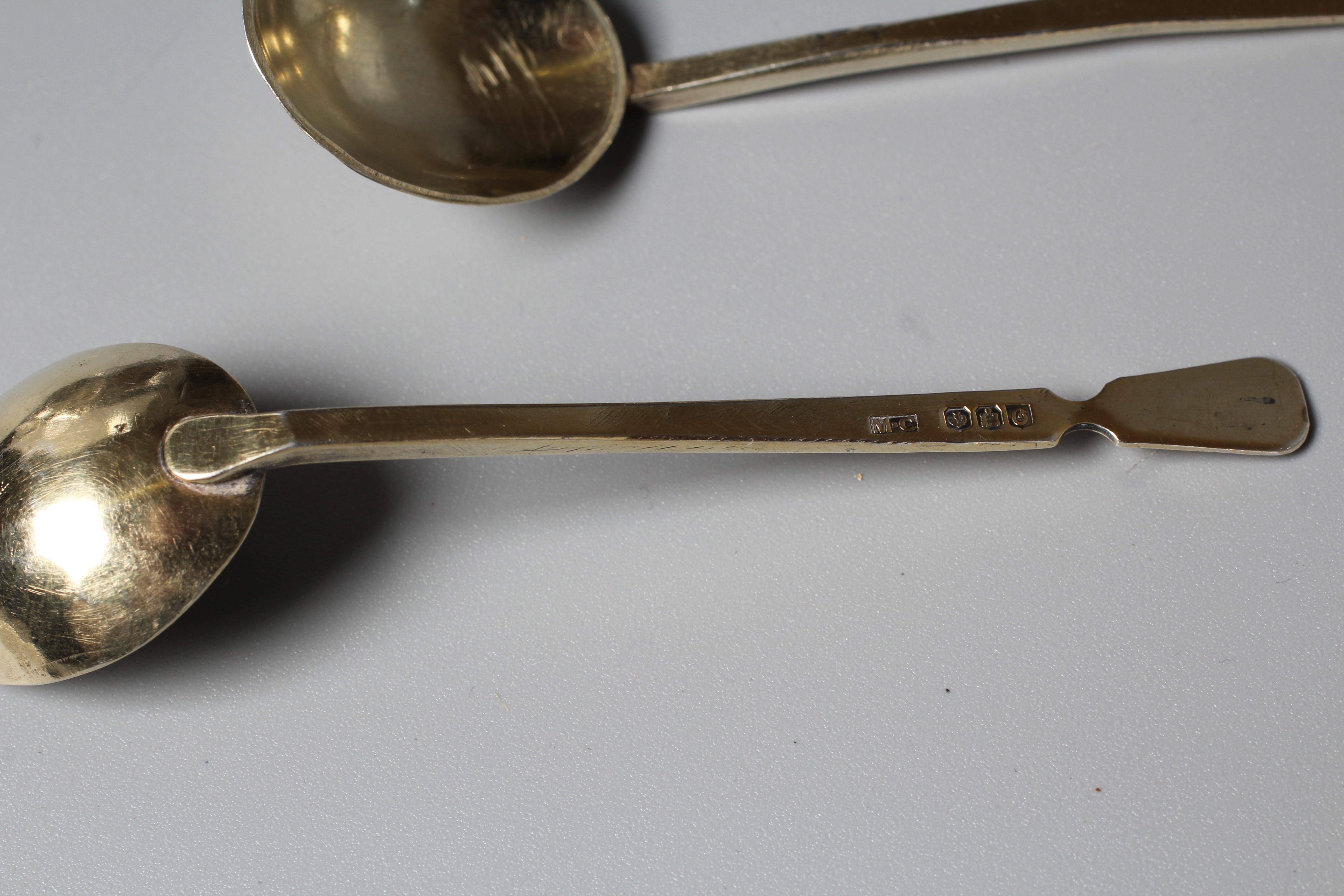 AN UNUSUAL SET OF SIX SCOTTISH SILVER GILT COFFEE SPOONS by Mabel Cambage (art student at Edinburgh) Image