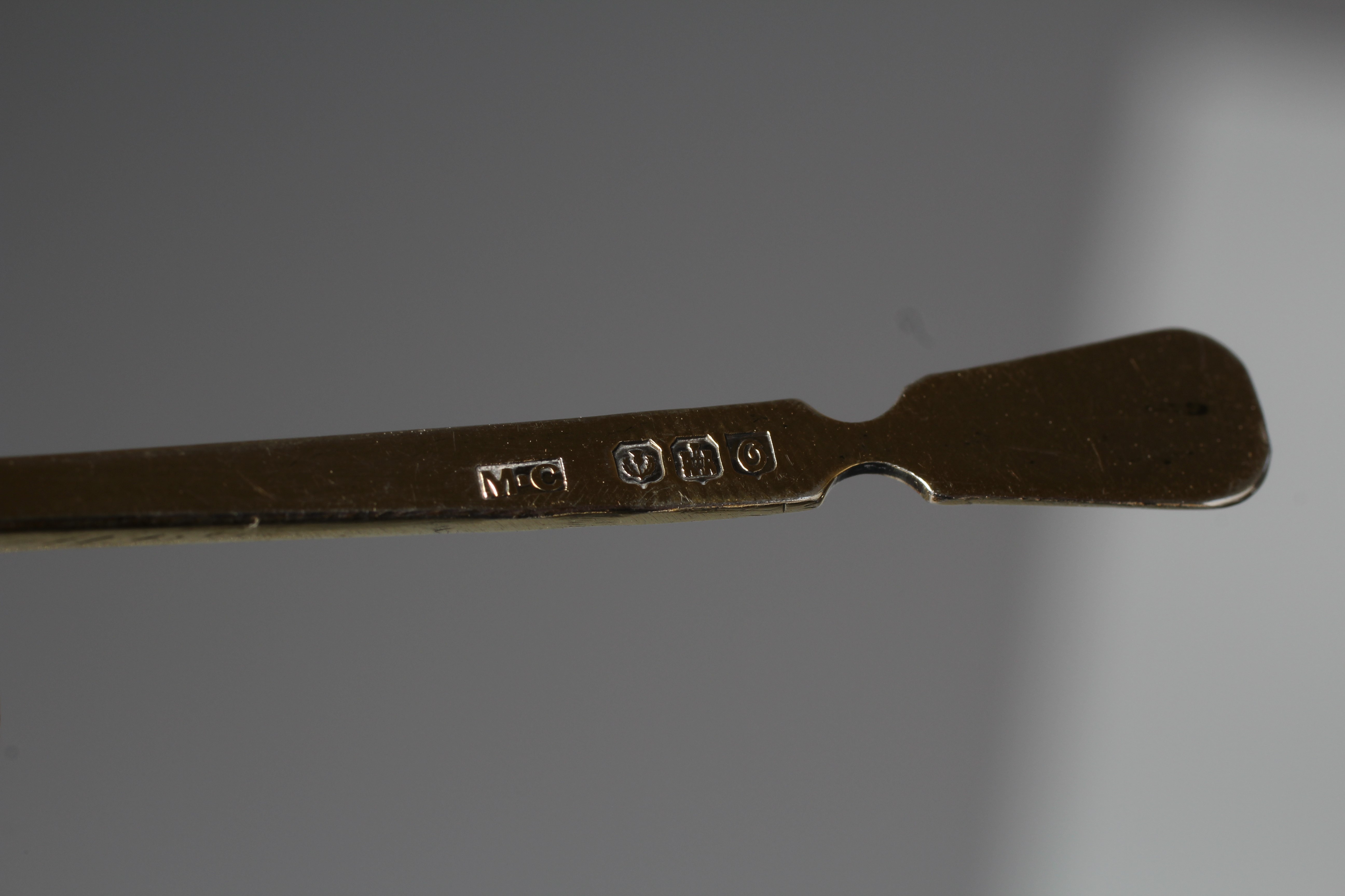 AN UNUSUAL SET OF SIX SCOTTISH SILVER GILT COFFEE SPOONS by Mabel Cambage (art student at Edinburgh) Image