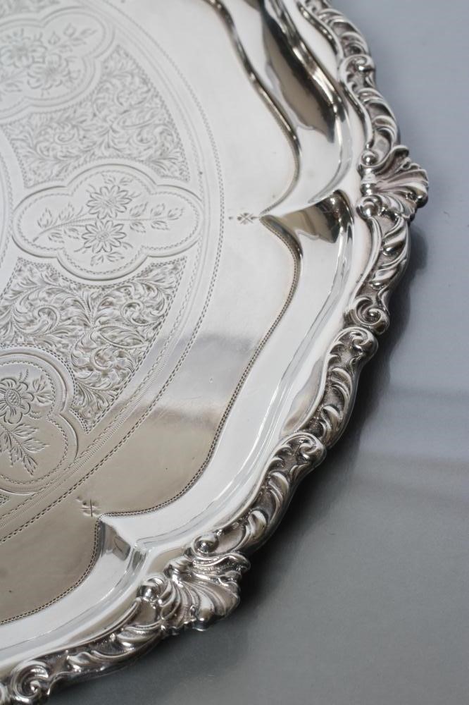 A LATE VICTORIAN SILVER SALVER Image