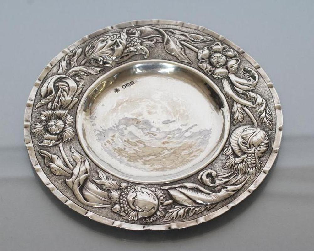 A LATE VICTORIAN ARTS AND CRAFTS SILVER PLATE Image