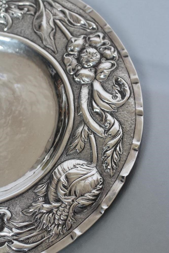 A LATE VICTORIAN ARTS AND CRAFTS SILVER PLATE Image