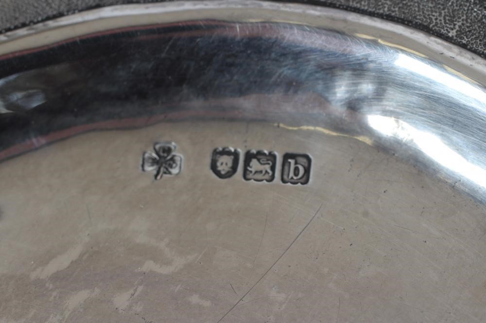 A LATE VICTORIAN ARTS AND CRAFTS SILVER PLATE Image